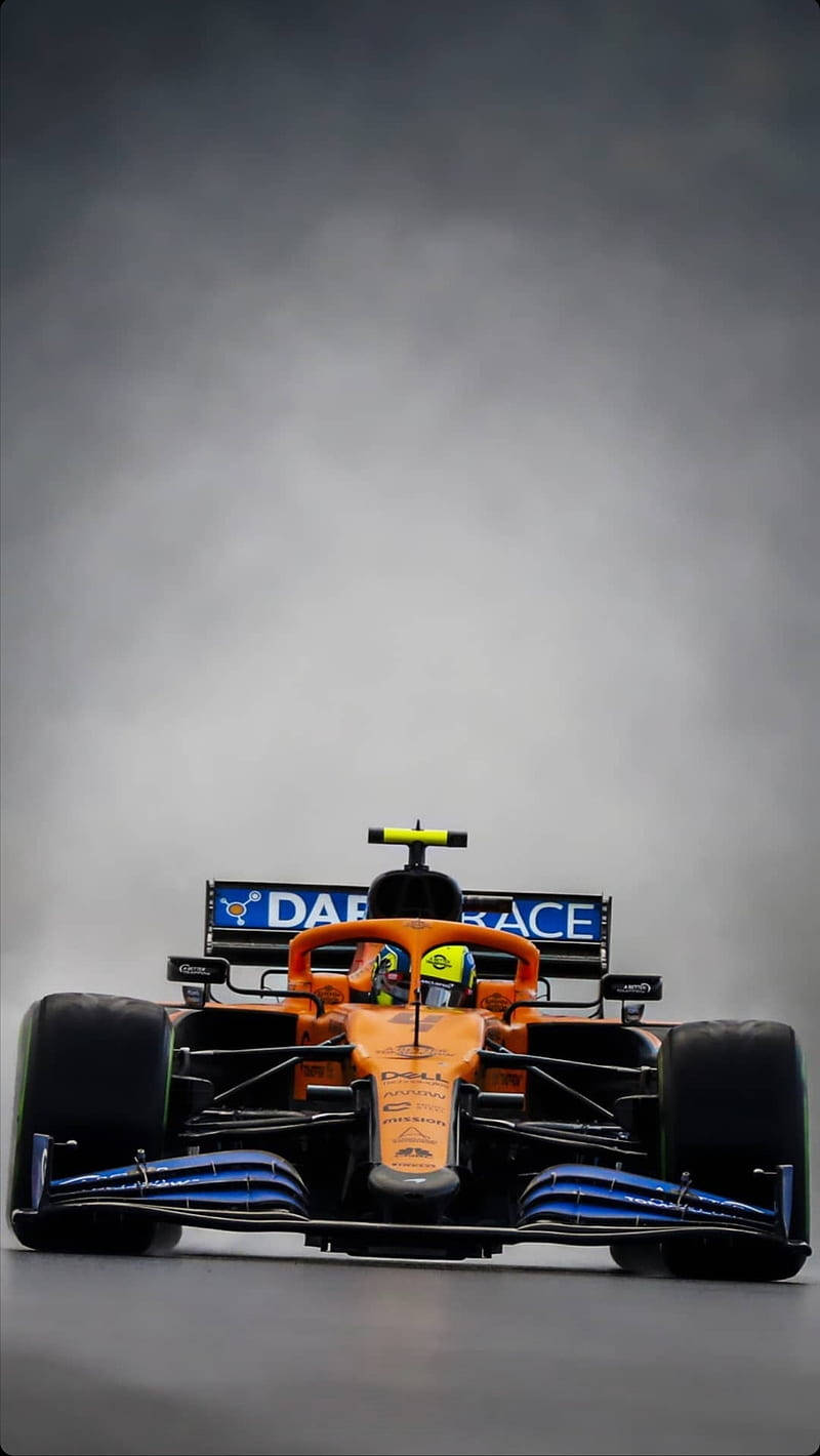 Lando Norris, orange and blue Formula 1 race car, gray track, HD Phone Wallpaper