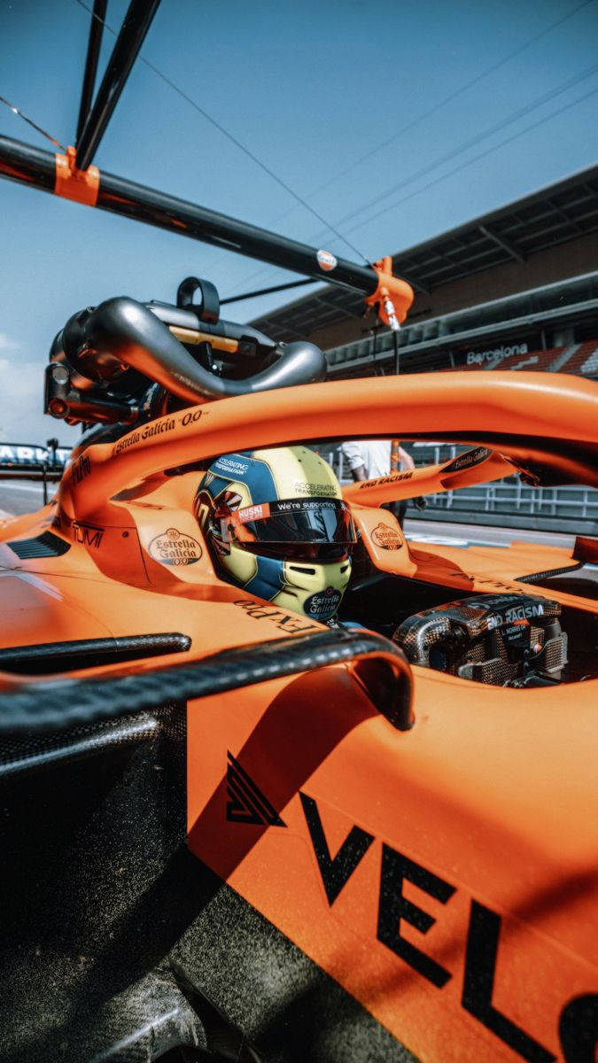 Lando Norris, orange McLaren Formula 1 car, racetrack, SD Phone Wallpaper