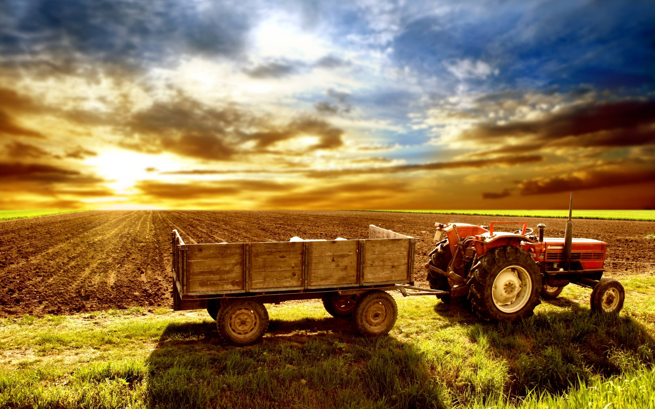 red tractor, wooden cart, freshly plowed field, 2K Desktop Wallpaper