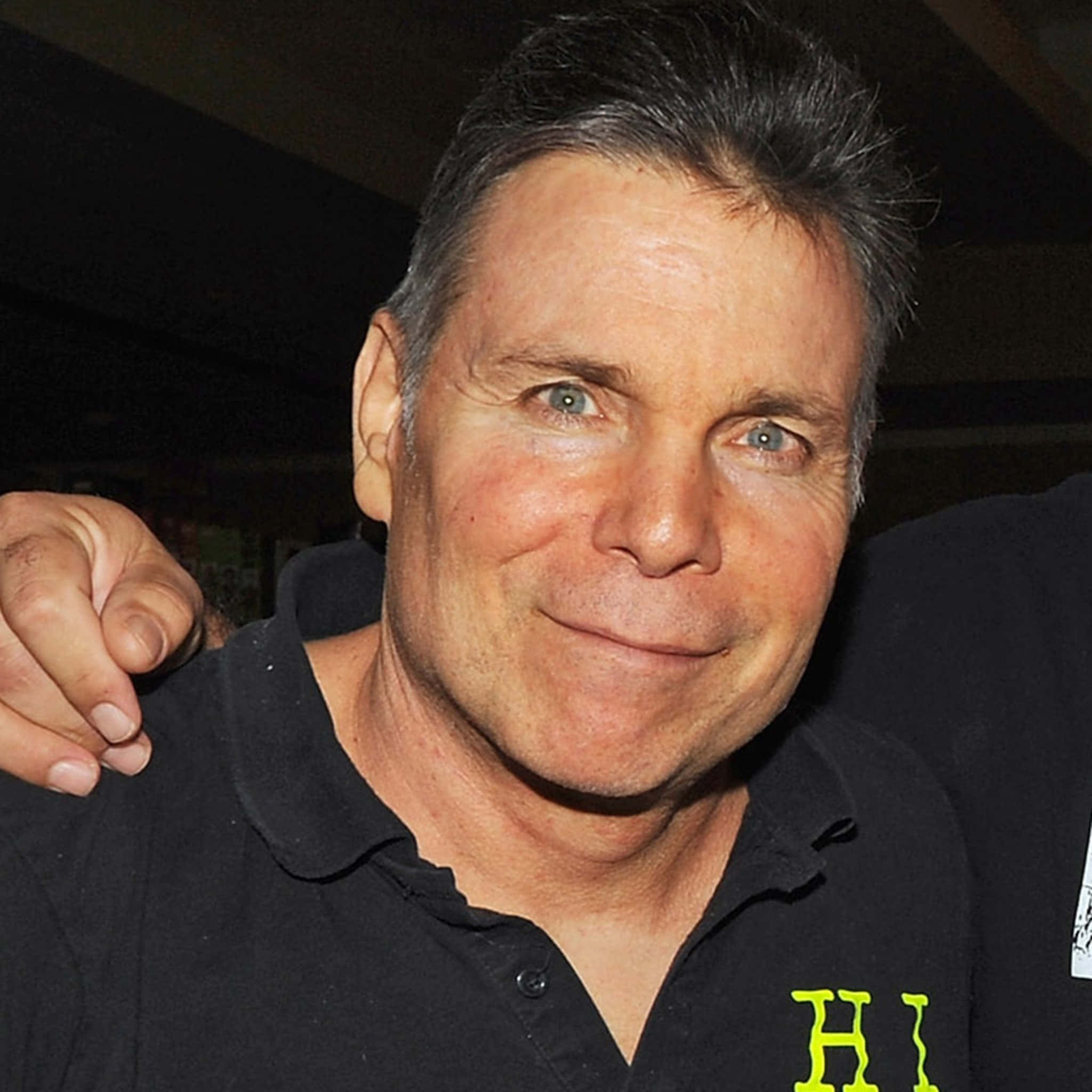 Lanny Poffo, black polo shirt, neon green letters, Full HD Desktop Wallpaper