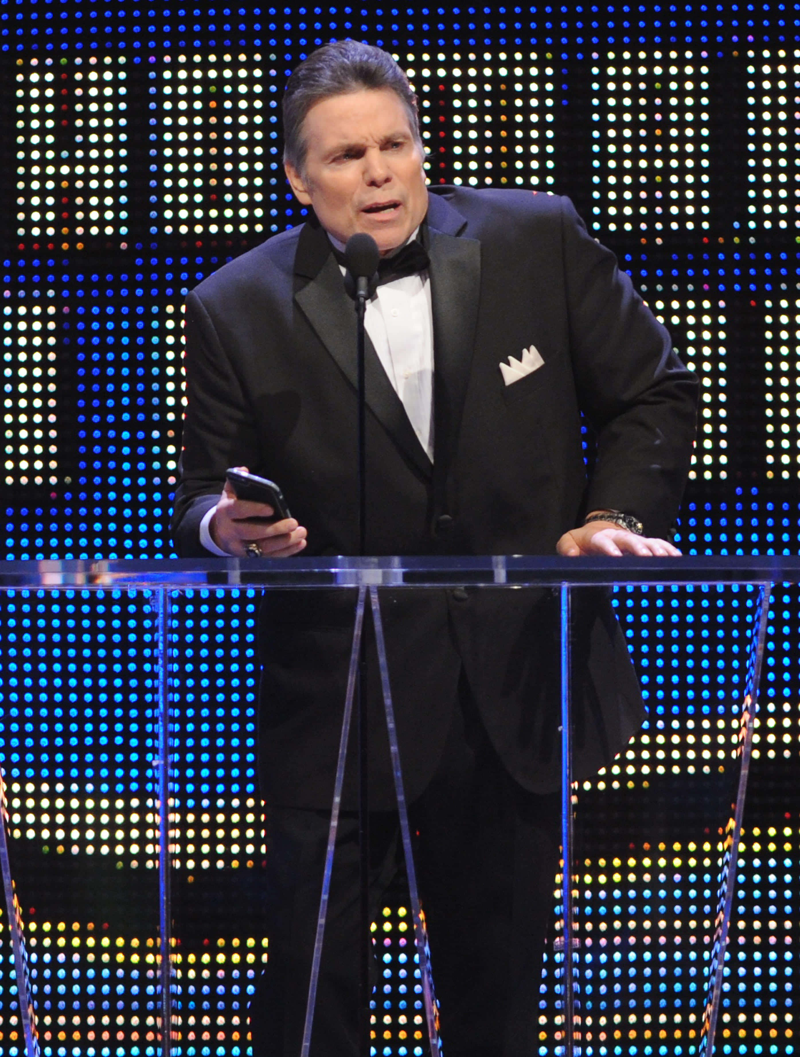 Lanny Poffo, glass table, black tuxedo, 2K Phone Wallpaper