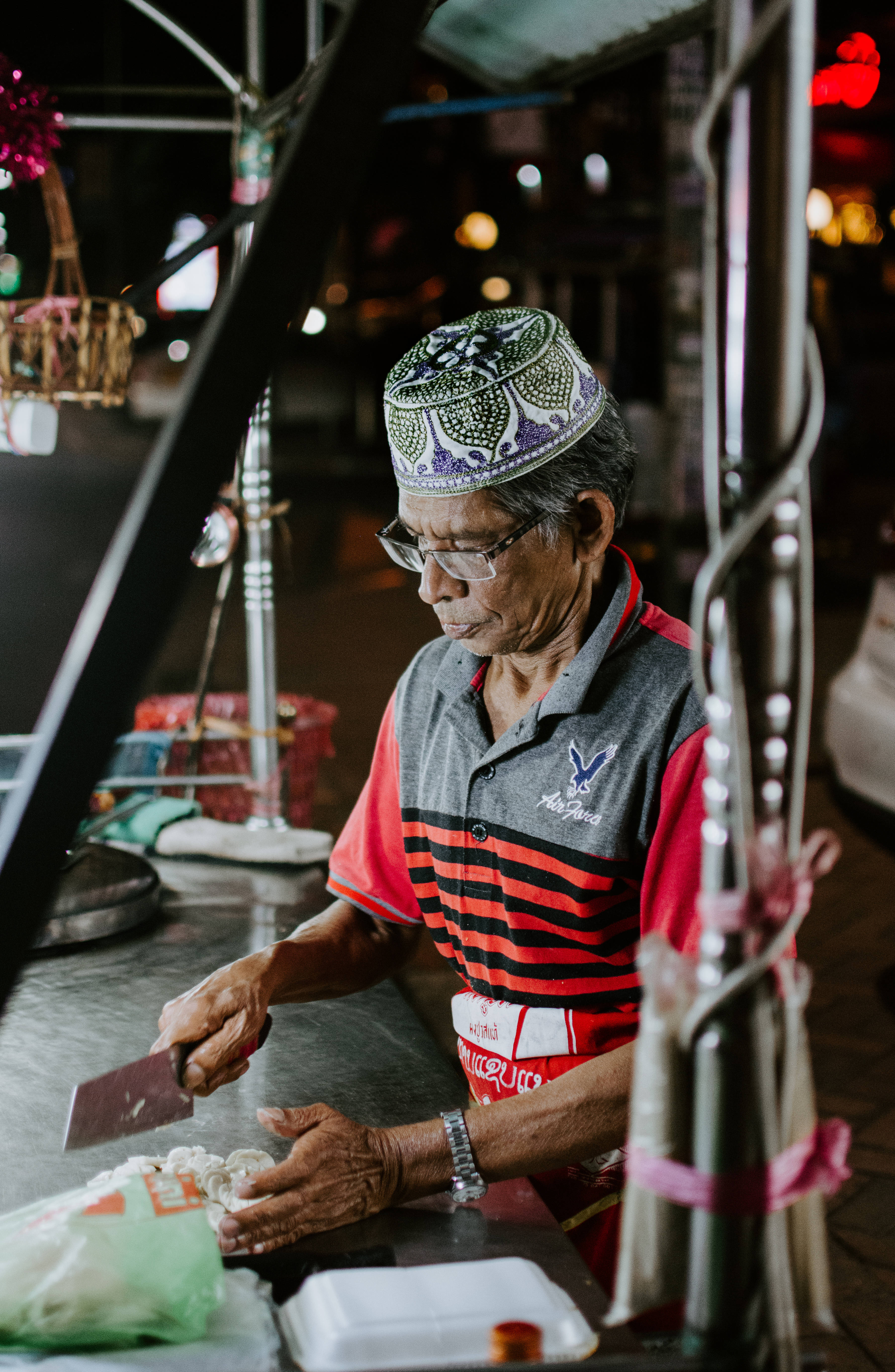 Laos, local street vendor, bustling night market stall, 5K Phone Wallpaper