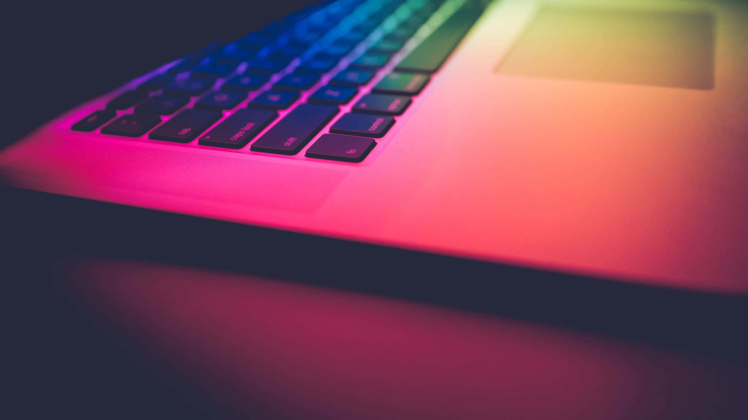 Apple Laptop, keyboard, rainbow backlighting, 2K Desktop Wallpaper