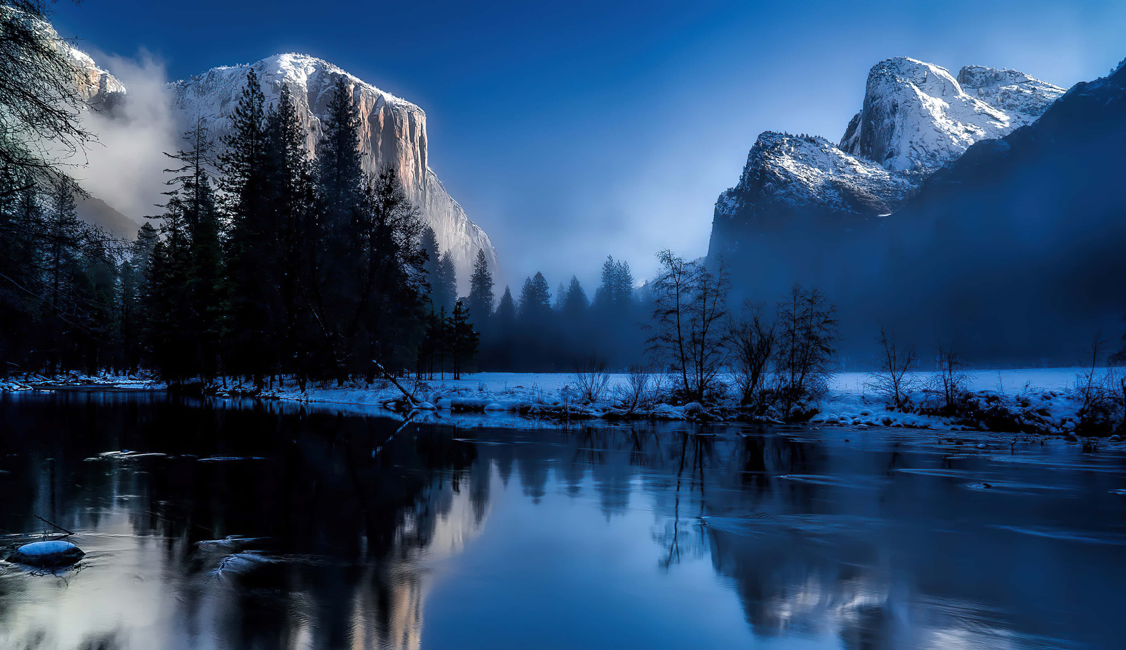 Laptop Winter, snowcapped granite cliffs, misty river, 4K Desktop Wallpaper