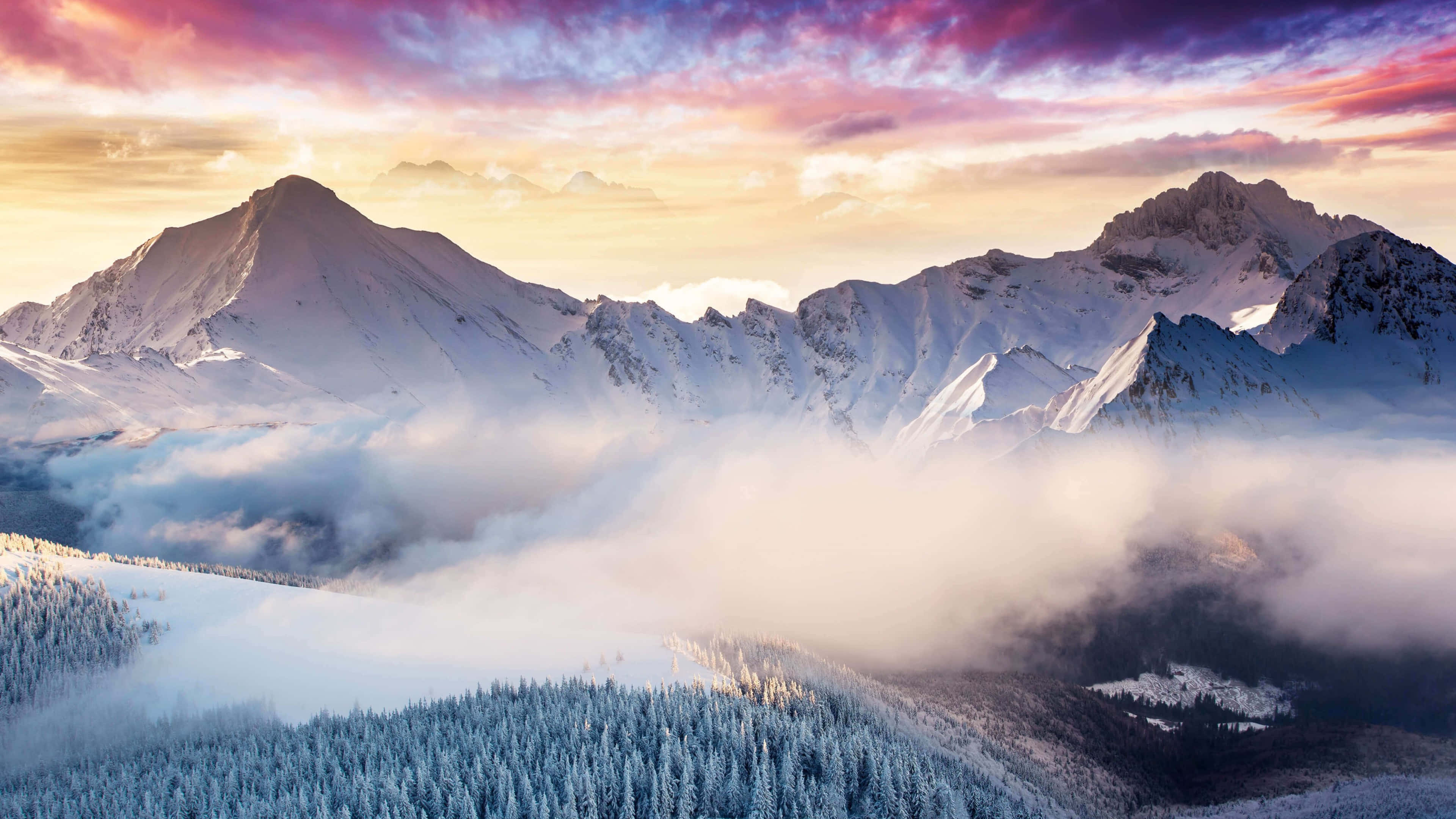 snowcapped mountain peaks, vibrant pink and gold sunset sky, sea of misty clouds, 4K Desktop Wallpaper