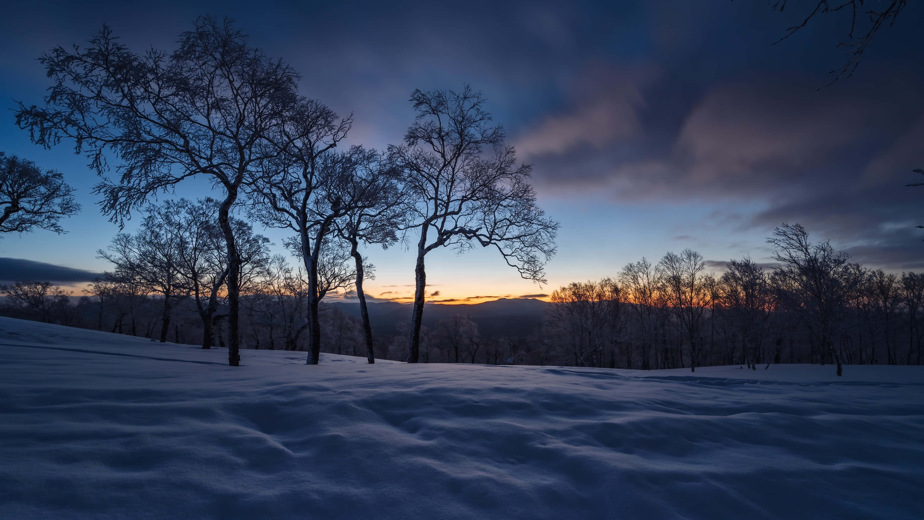 winter laptop, twilight sky, orange and blue hues, 4K Desktop Wallpaper