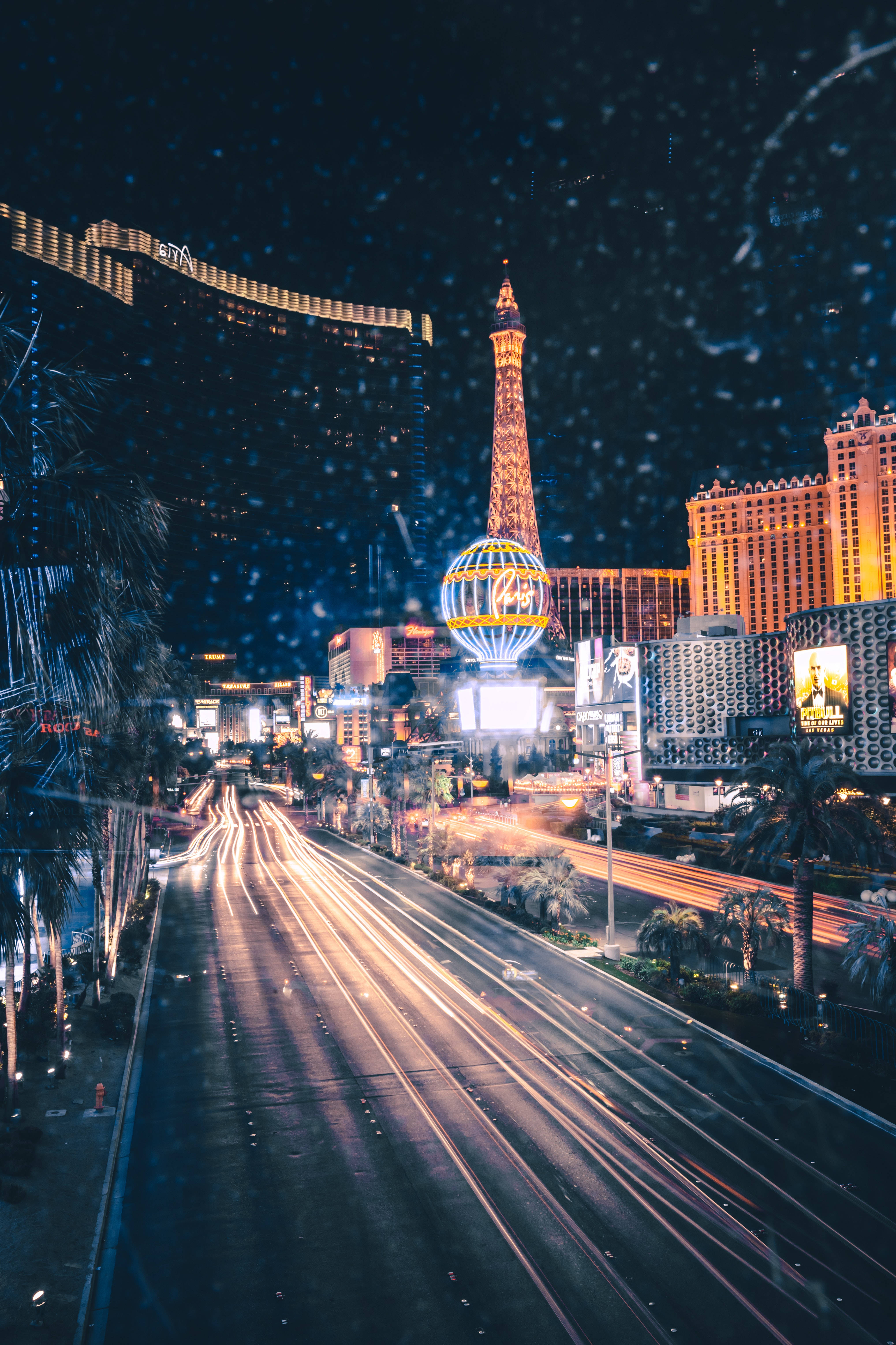 Las Vegas, night, rain-slicked street, 5K Phone Wallpaper
