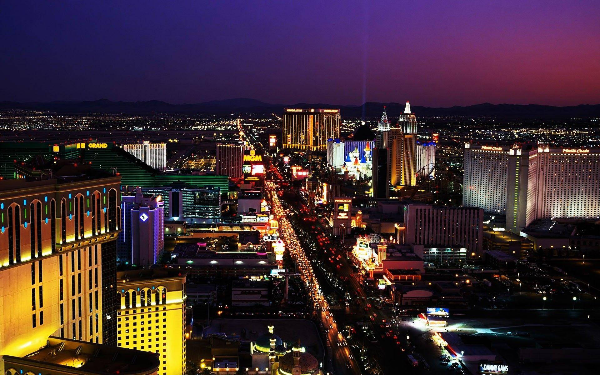 Las Vegas Strip, neon-lit hotels, bustling traffic, Full HD Desktop Wallpaper