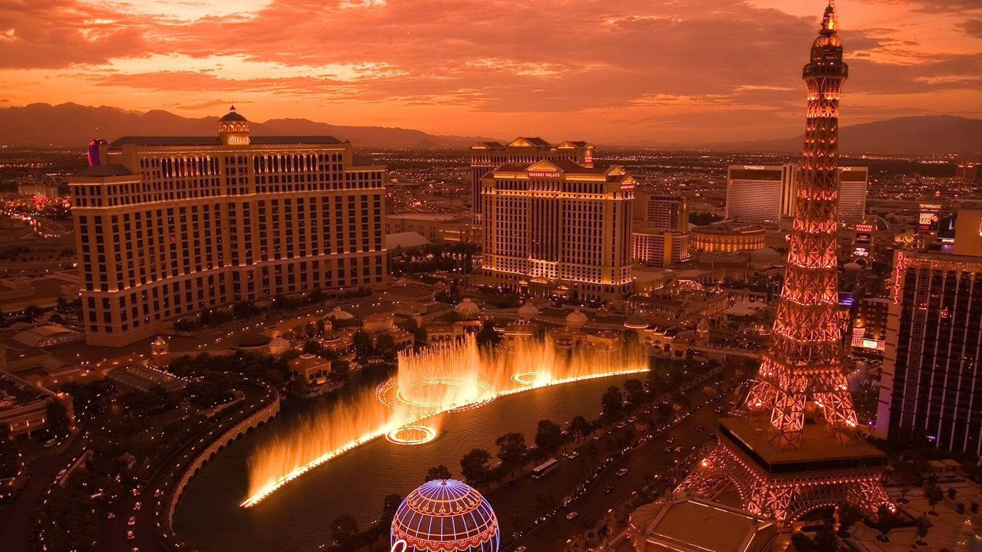Las Vegas Strip, orange sunset sky, illuminated fountains, Full HD Desktop Wallpaper