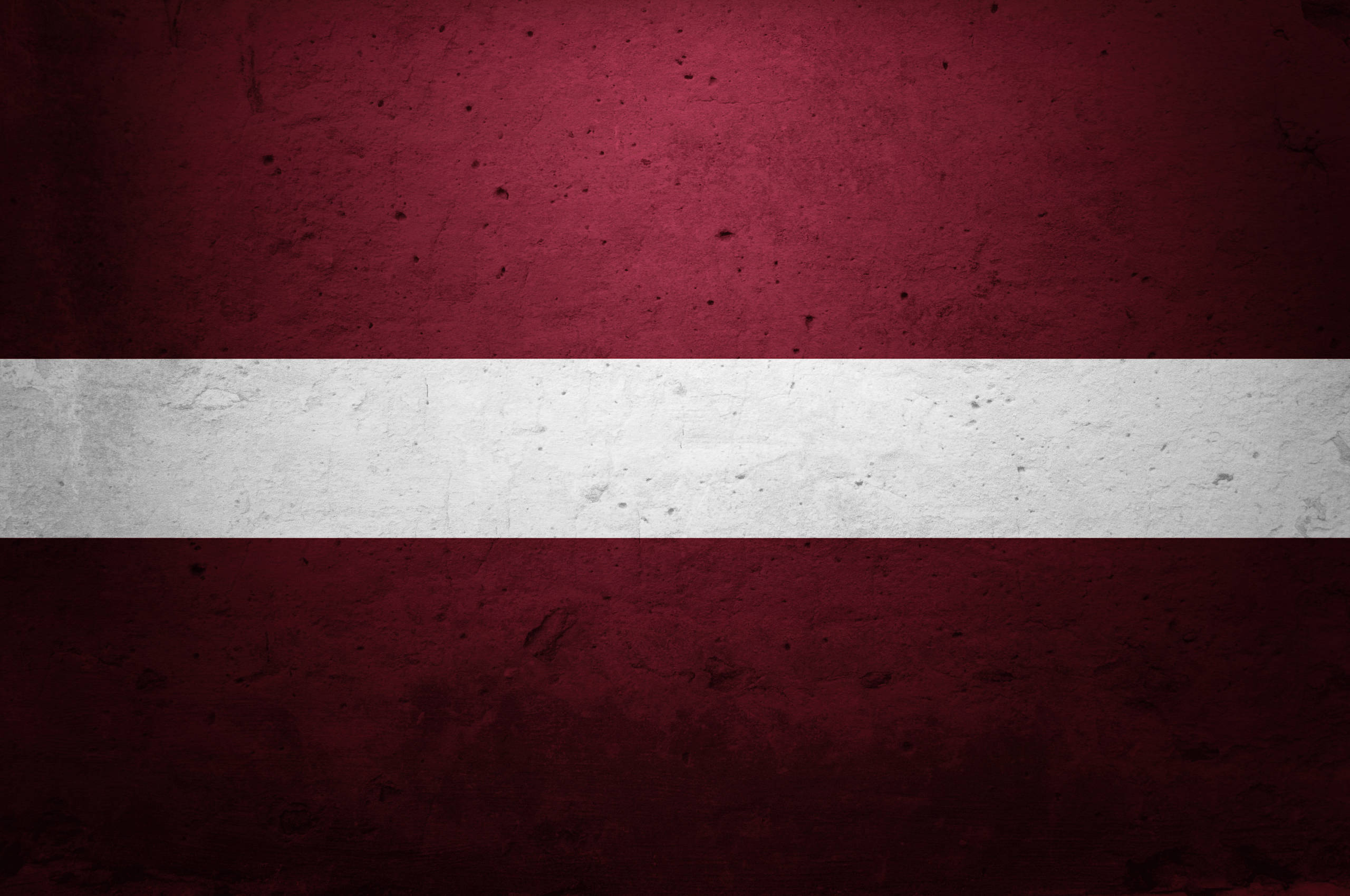 Latvia, red and white horizontal stripes, weathered textured flag, 2K Desktop Wallpaper
