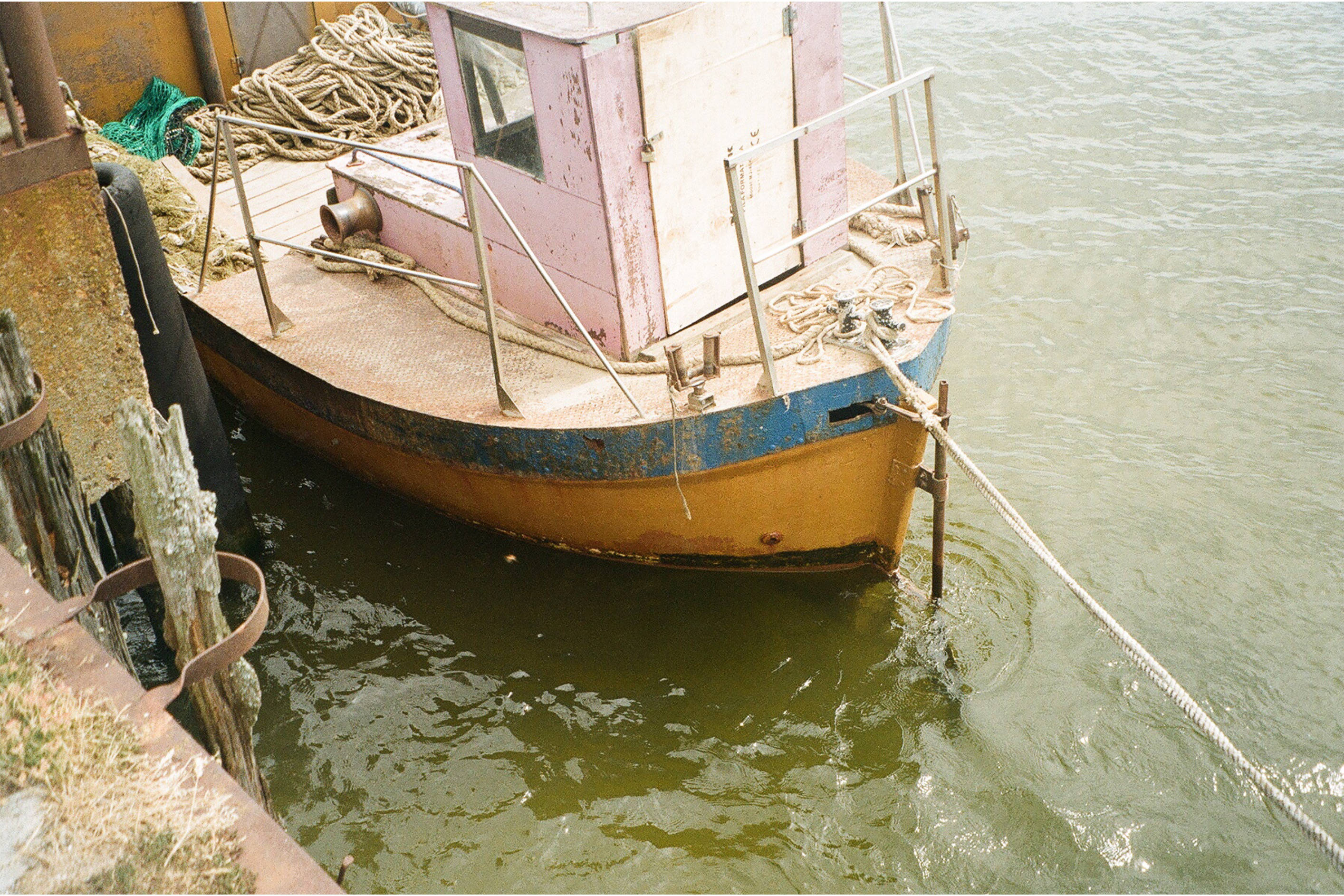 brown boat, Latvia, yellow and blue fishing boat, 2K Desktop Wallpaper