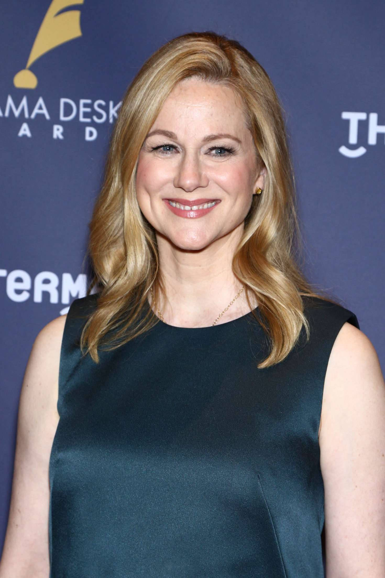 Laura Linney, dark teal sleeveless dress, blue branded backdrop, Full HD Phone Wallpaper