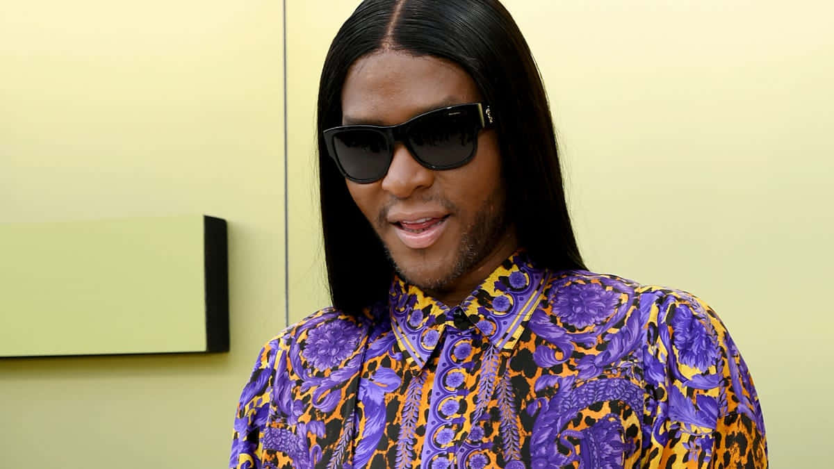 Law Roach, purple and orange patterned shirt, long black hair, SD Desktop Wallpaper