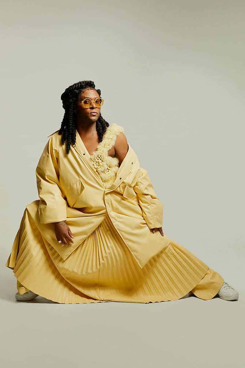 Law Roach, yellow pleated coat, fur collar, SD Phone Wallpaper