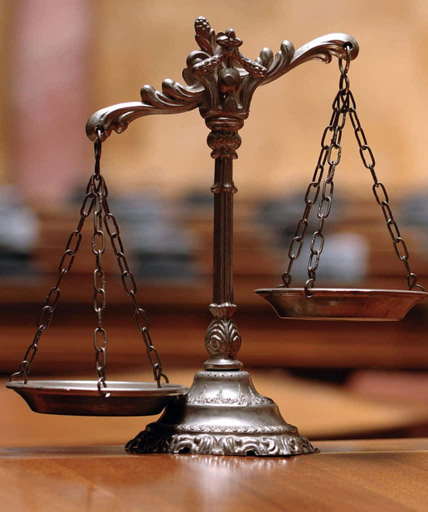 Legislative Justice Balance Figure, ornate metal scale of justice, one pan tilted down, SD Phone Wallpaper