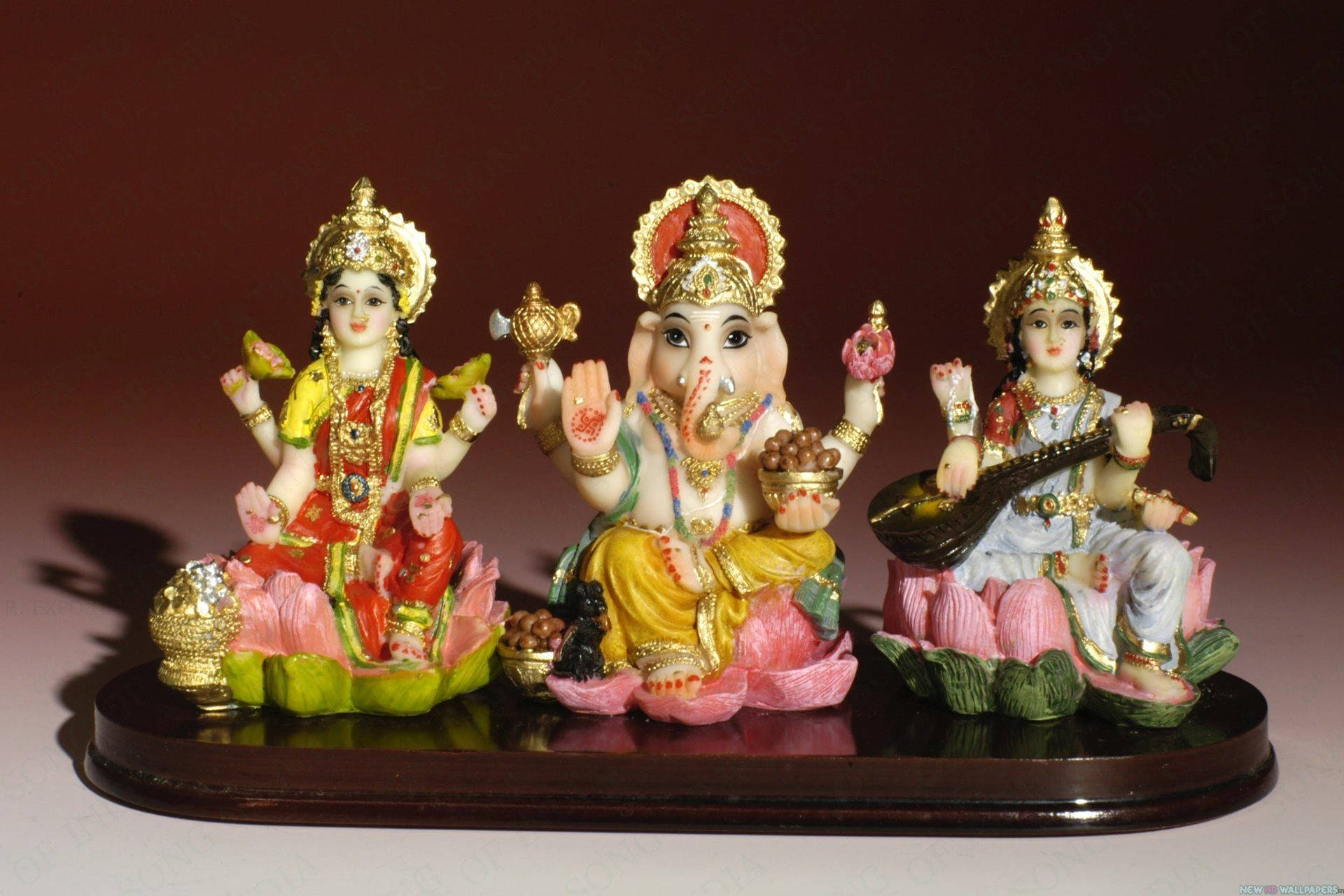 Laxmi Ganesh Saraswati, lotus bases, dark wooden stand, Full HD Desktop Wallpaper