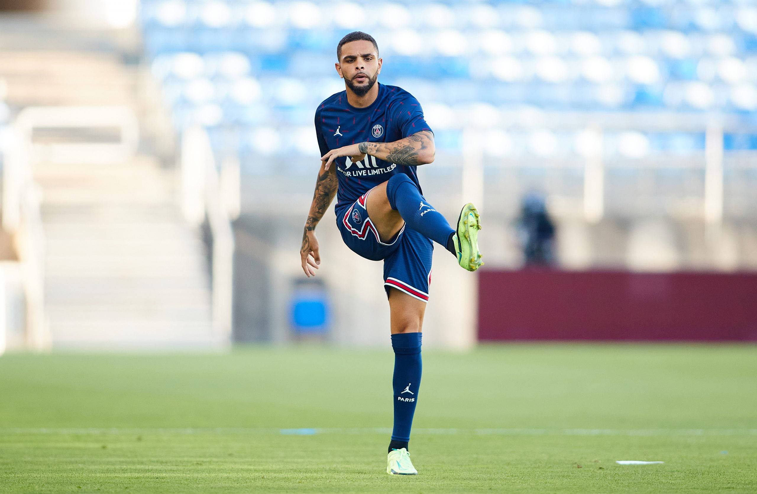 Layvin Kurzawa, blue Paris Saint-Germain jersey, vibrant green pitch, 2K Desktop Wallpaper