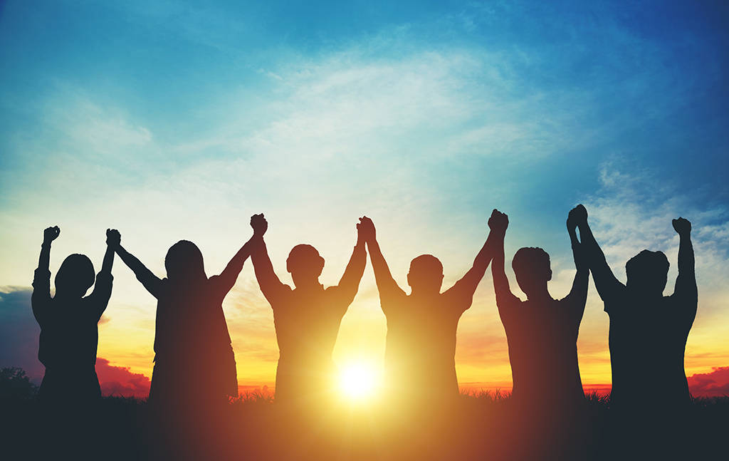 silhouetted group of people, holding hands, raising arms in unity, SD Desktop Wallpaper