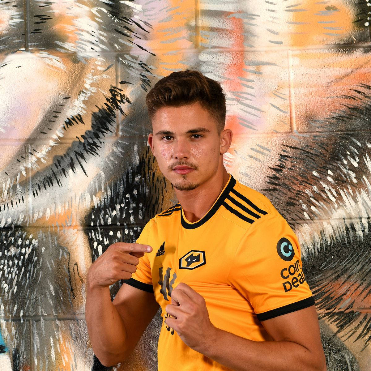 Leander Dendoncker, yellow jersey, graffiti-covered brick wall, SD Desktop Wallpaper