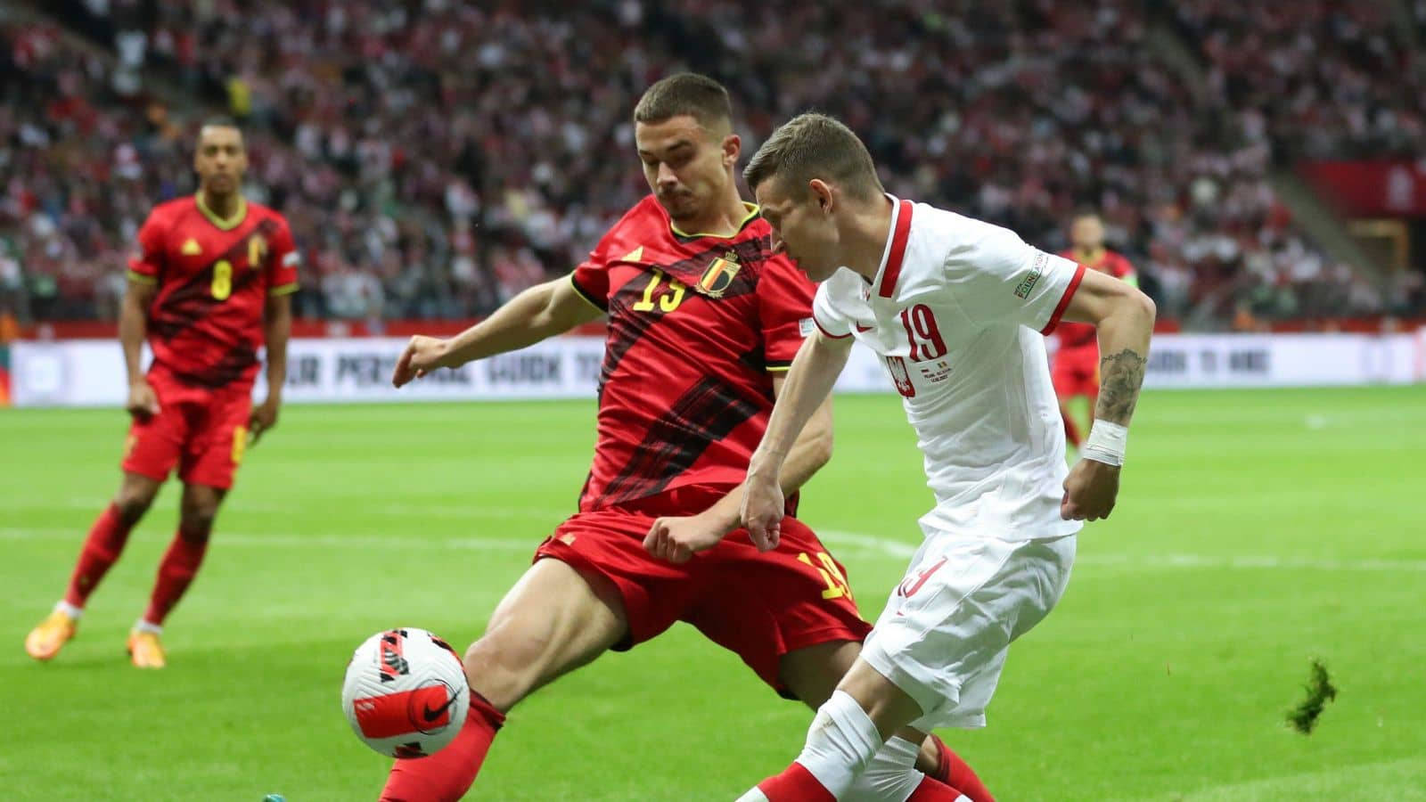 Leander Dendoncker, red and white jerseys, vibrant green pitch, HD Desktop Wallpaper