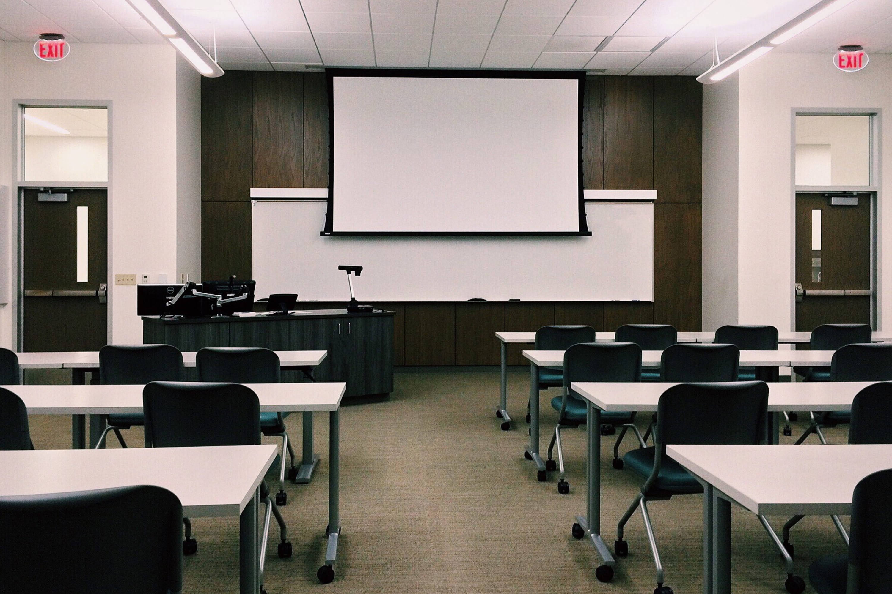 modern classroom, white desks, black chairs, 2K Desktop Wallpaper