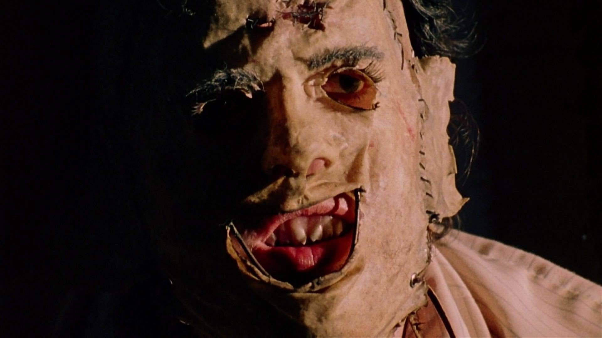 Leatherface, grotesque stitched-up face, bloodied eyes, Full HD Desktop Wallpaper