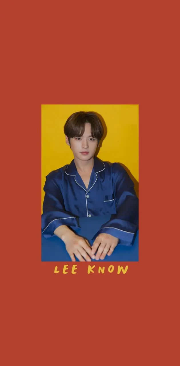 Lee Know, blue satin pajamas, vibrant yellow backdrop, SD Phone Wallpaper