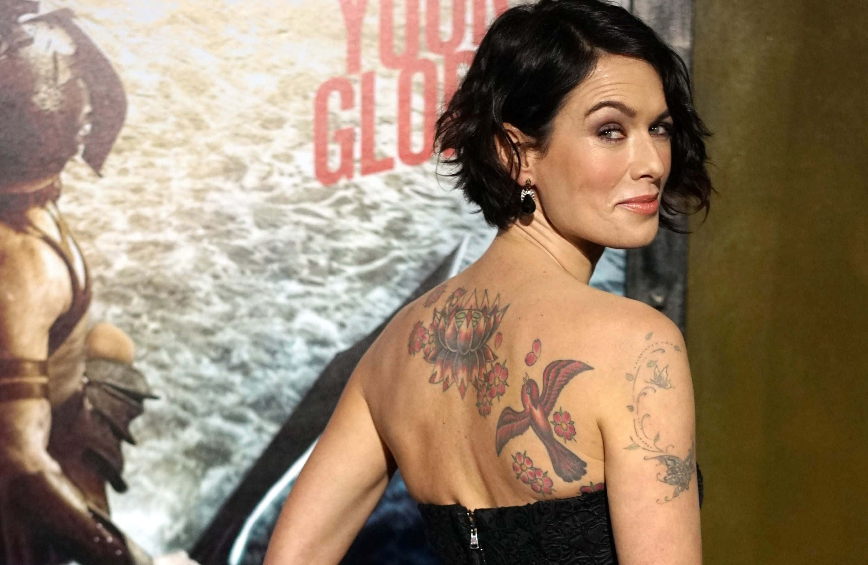Lena Headey, short dark hair, tattoos of a bird and flowers, 2K Desktop Wallpaper