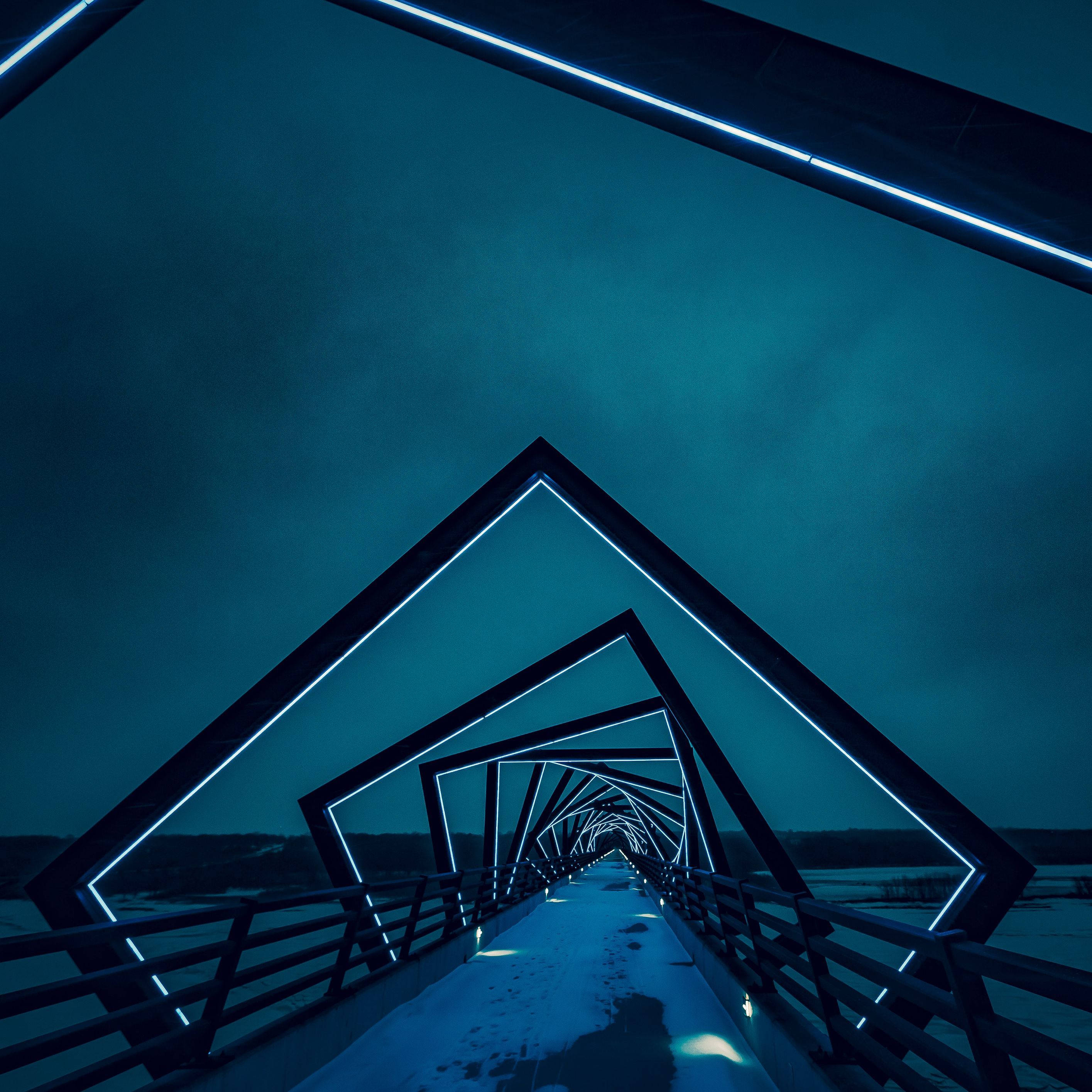 Lenovo Tablet, glowing blue neon lights, futuristic geometric bridge, 2K Desktop Wallpaper