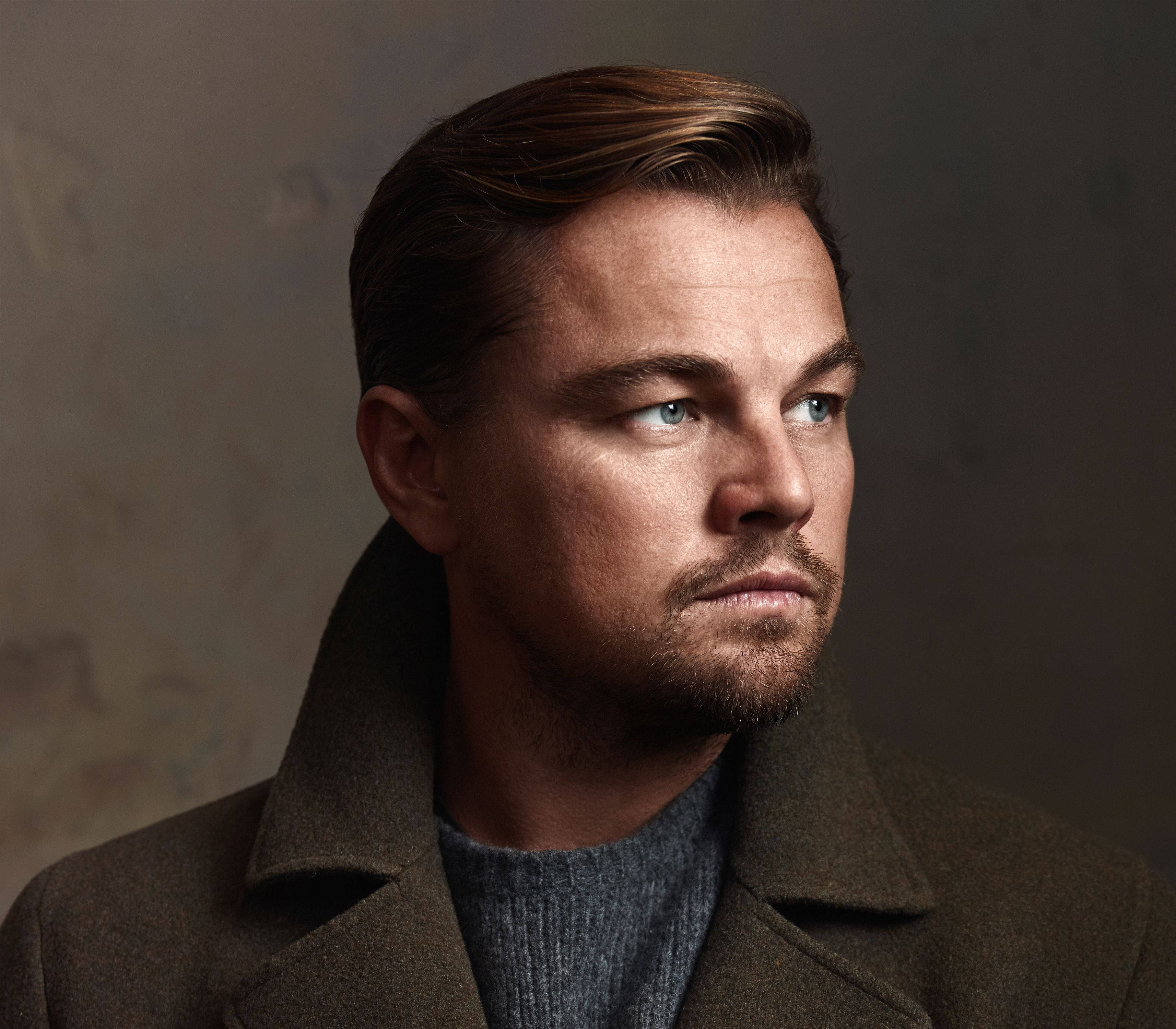 Leonardo DiCaprio, brown coat, intense blue eyes, 2K Desktop Wallpaper