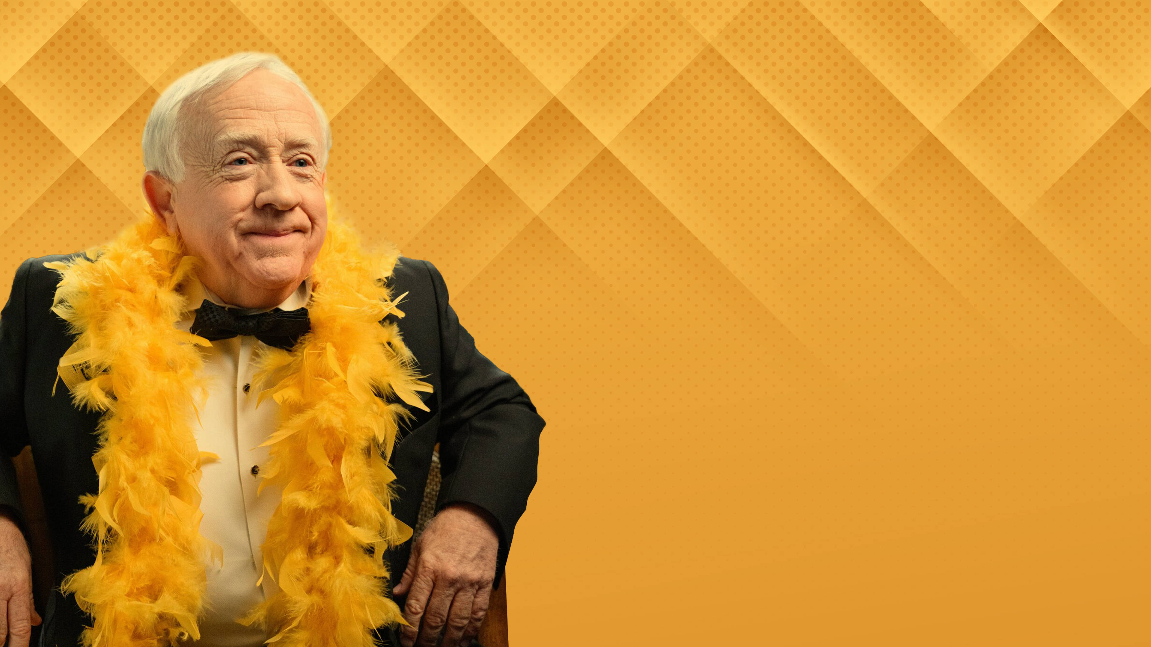 Leslie Jordan, tuxedo, bright yellow feather boa, 4K Desktop Wallpaper