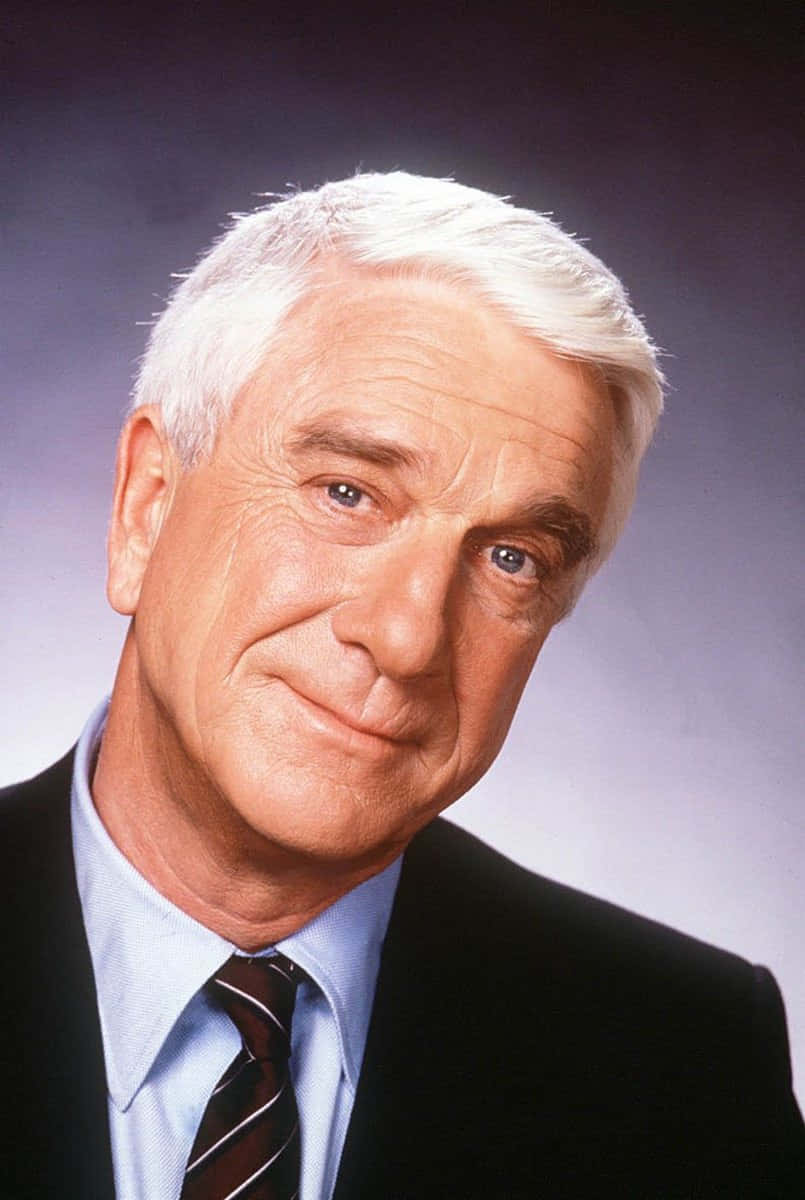 Leslie Nielsen, dark suit, striped tie, SD Phone Wallpaper