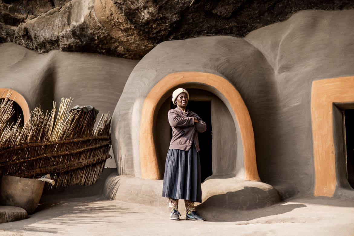 Lesotho, woman, traditional cave dwelling, SD Desktop Wallpaper
