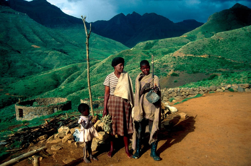 Lesotho mountains, three people, dirt path, SD Desktop Wallpaper