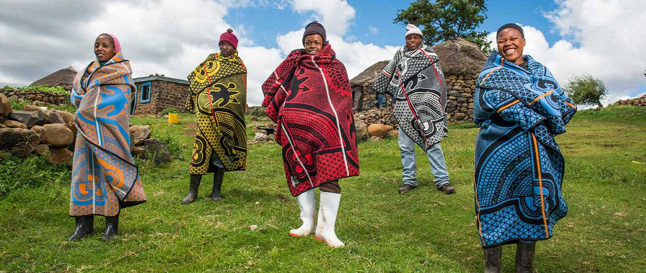 Lesotho, five smiling women, vibrant patterned shawls, HD Desktop Wallpaper