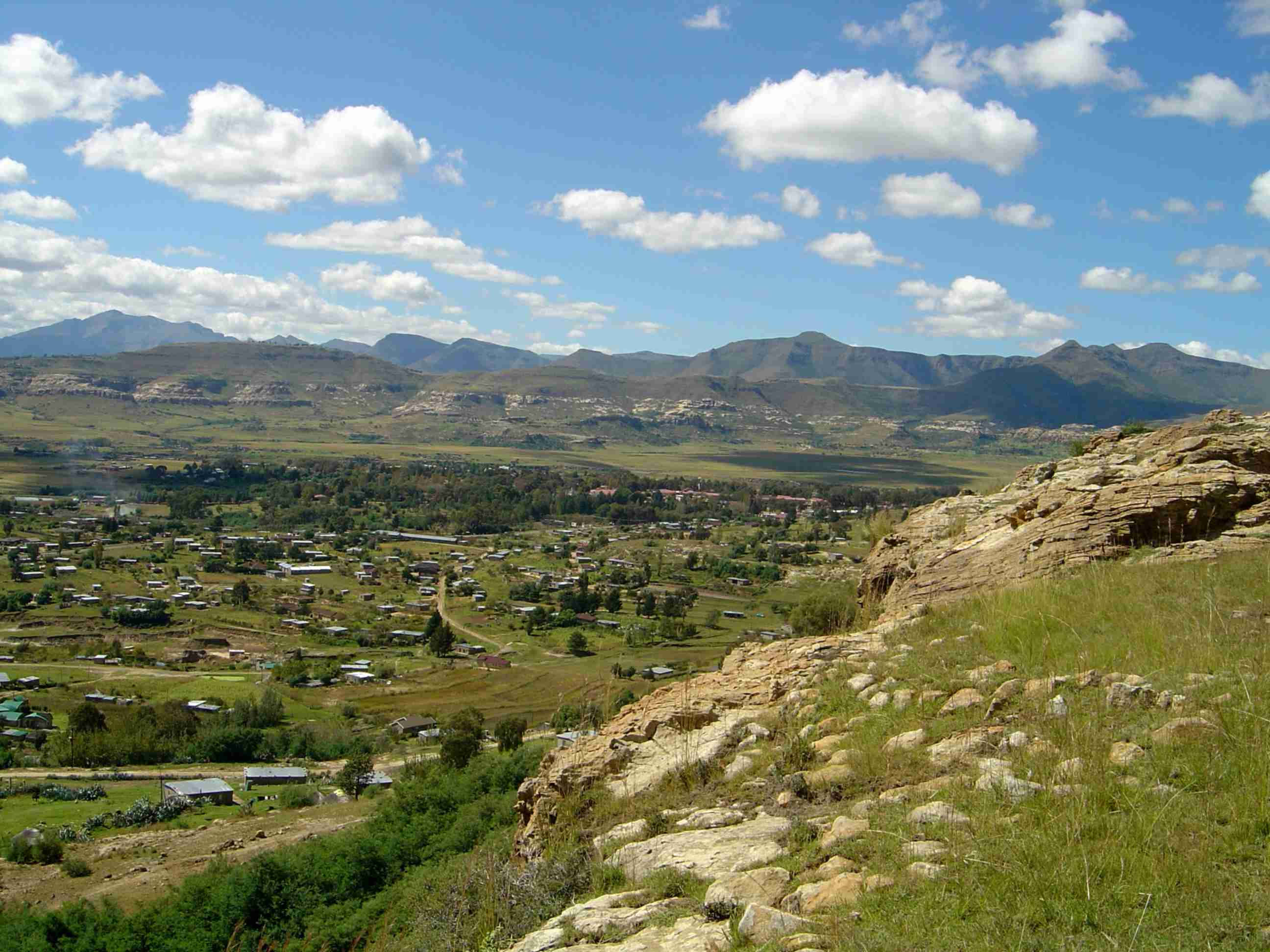 Lesotho, rocky mountain village, green hills, 2K Desktop Wallpaper