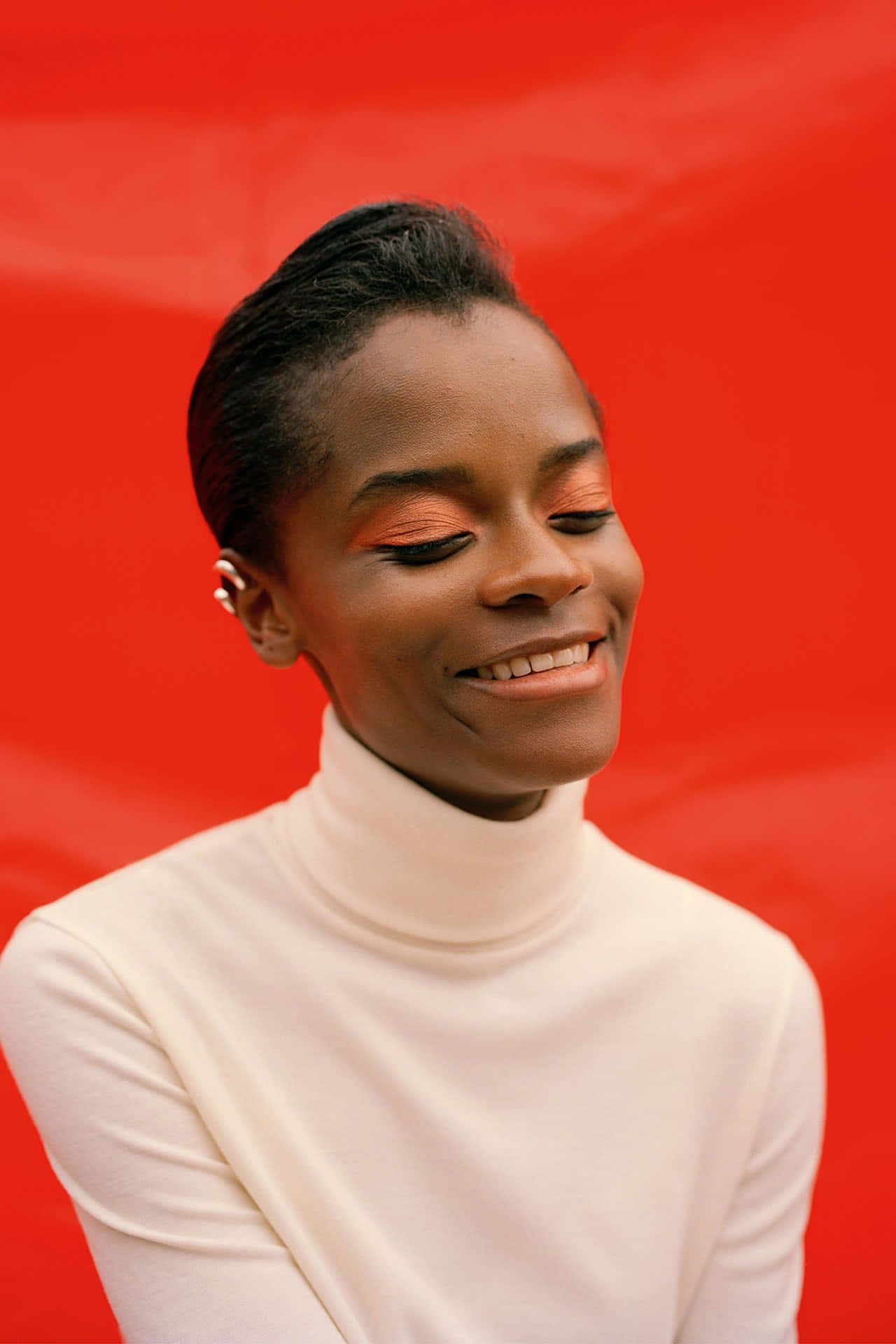 Letitia Wright, white turtleneck, bold orange eyeshadow, Full HD Phone Wallpaper