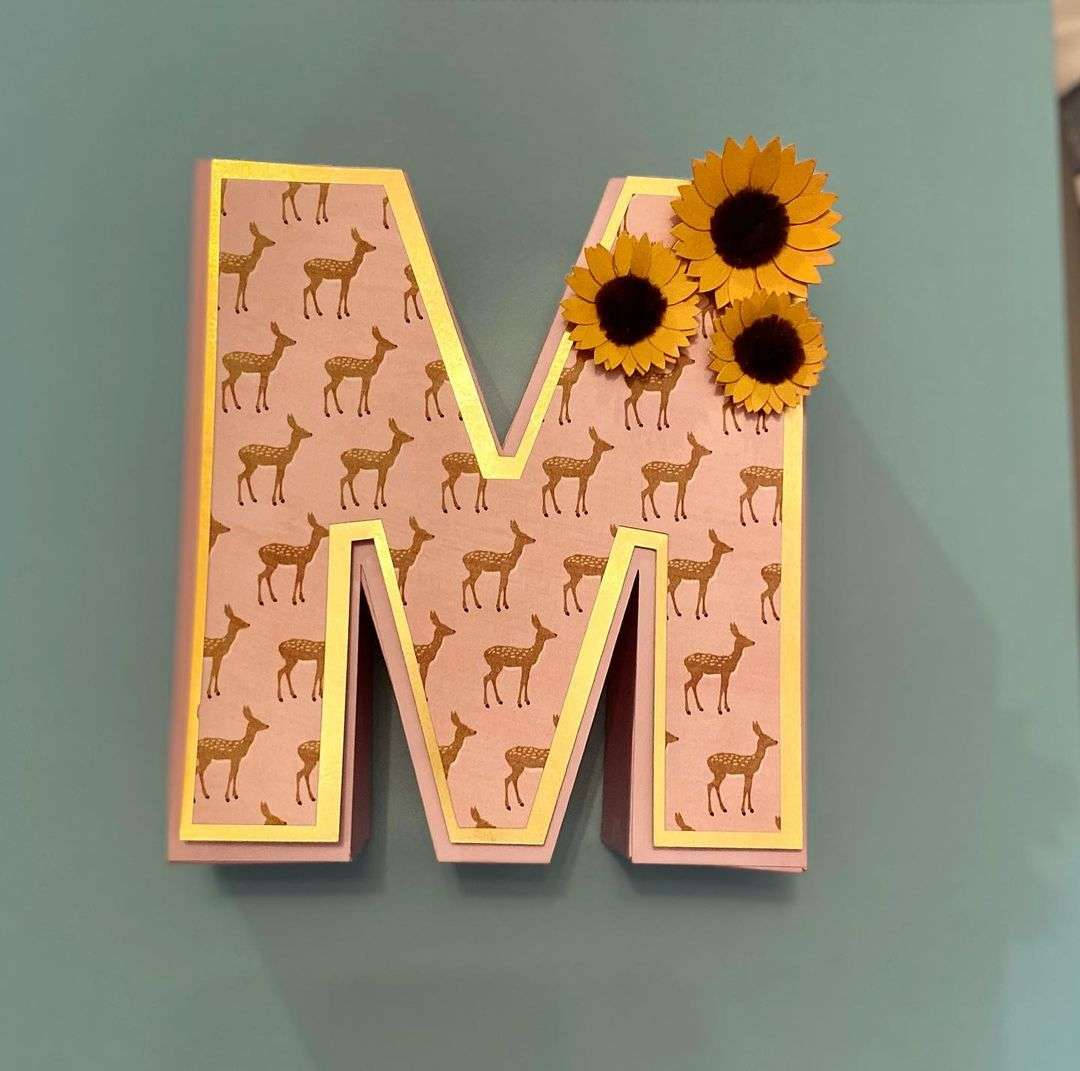 pink letter M, gold deer pattern, sunflowers, SD Desktop Wallpaper