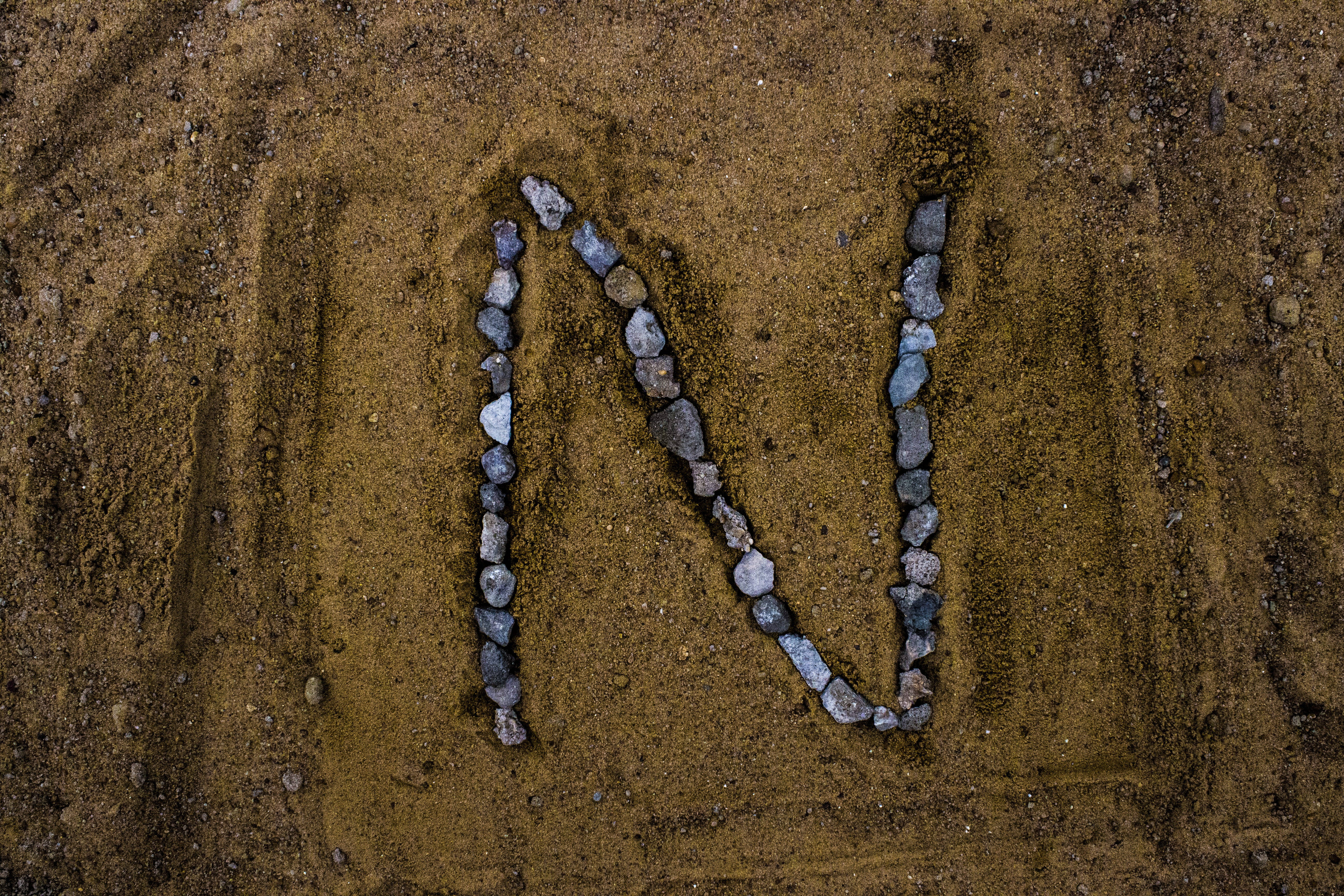 Pebbles Letter N, letter N, small stones, 5K Desktop Wallpaper