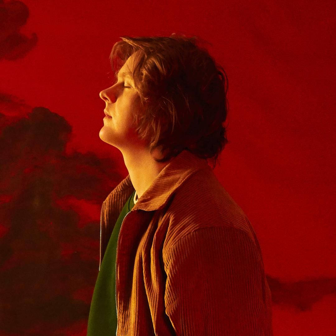 Lewis Capaldi, corduroy jacket, dramatic red sky, SD Desktop Wallpaper