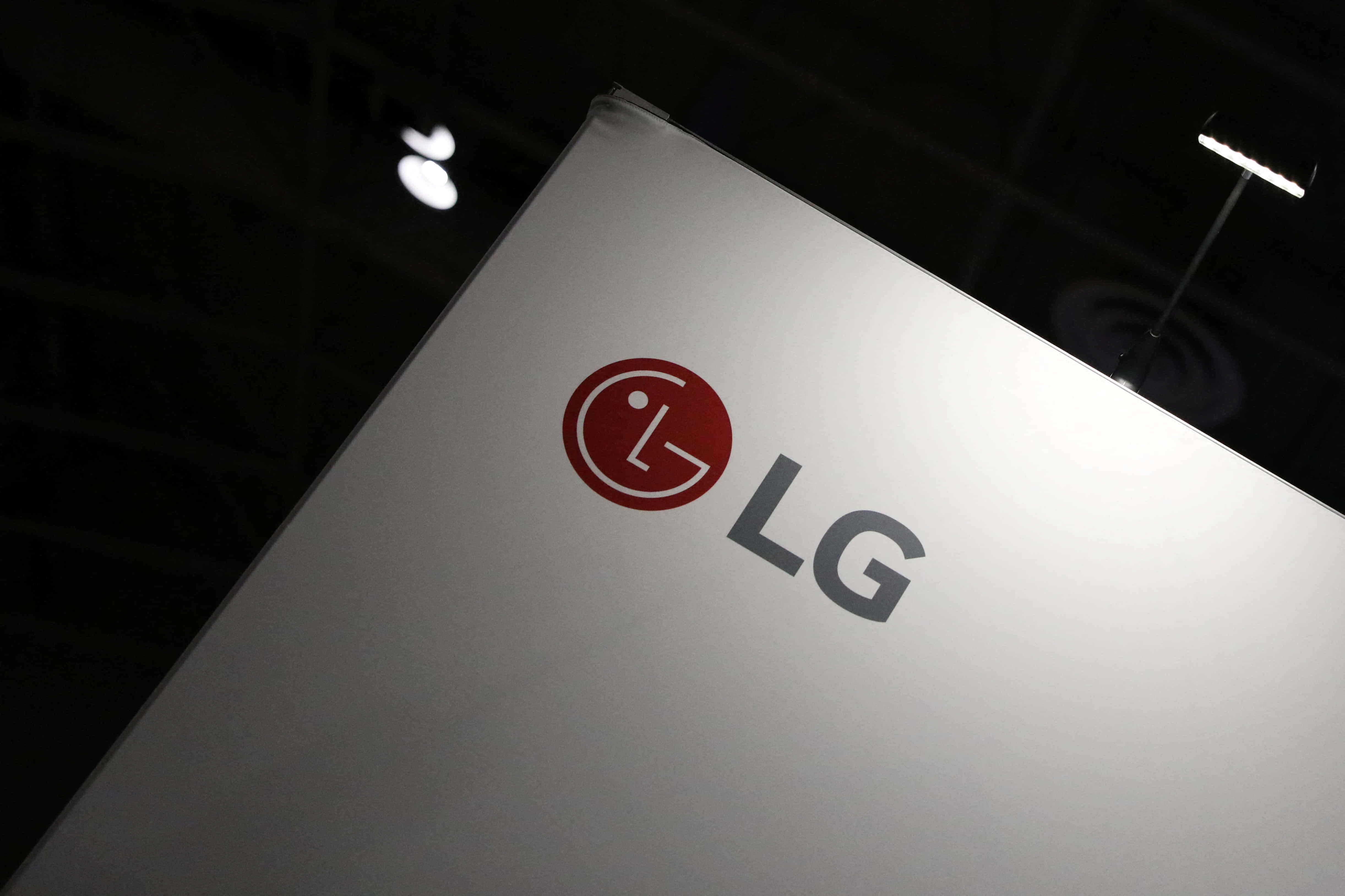 LG logo, white display panel, bright spotlights, 4K Desktop Wallpaper