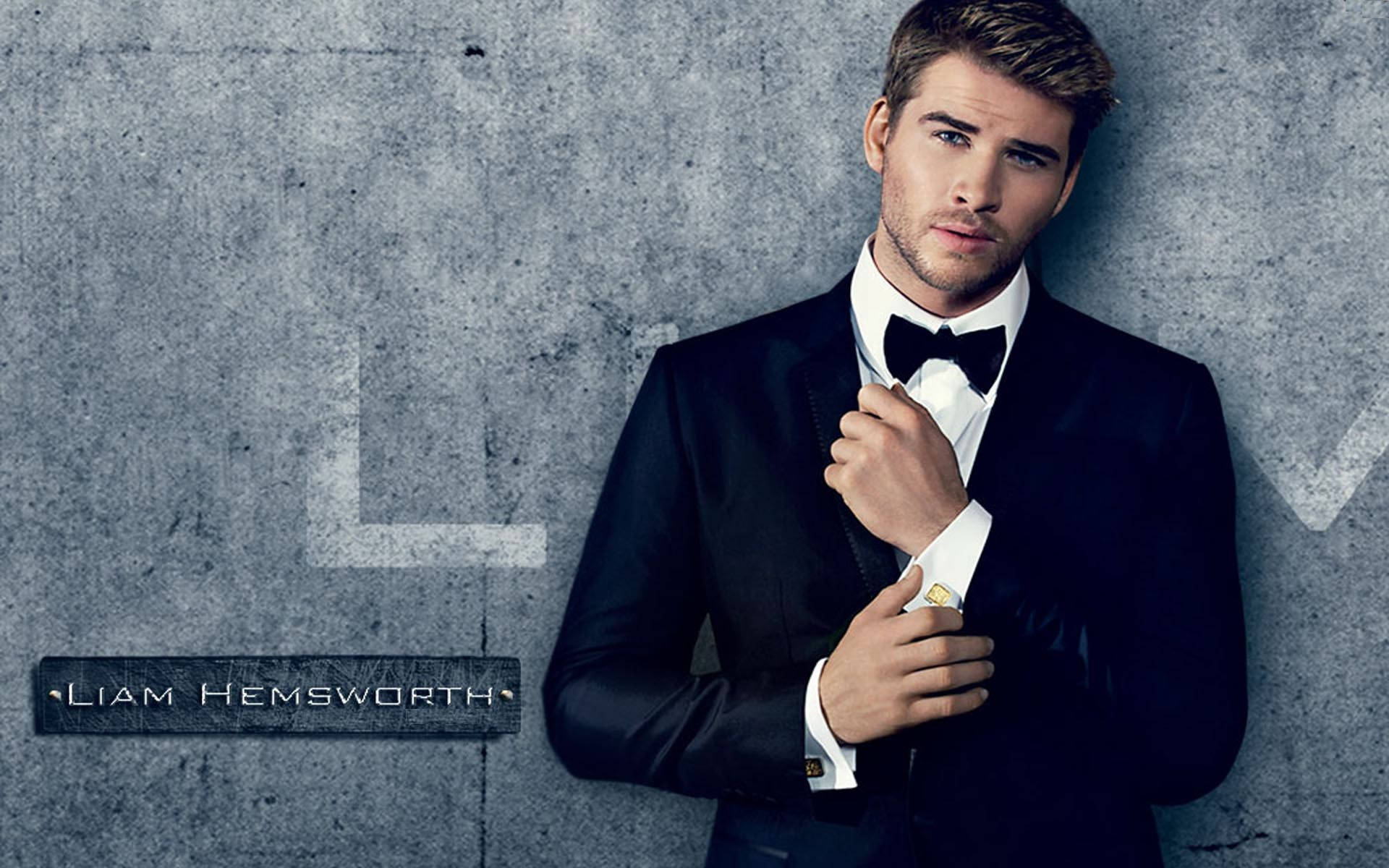 Liam Hemsworth, black tuxedo, blue wall, Full HD Desktop Wallpaper
