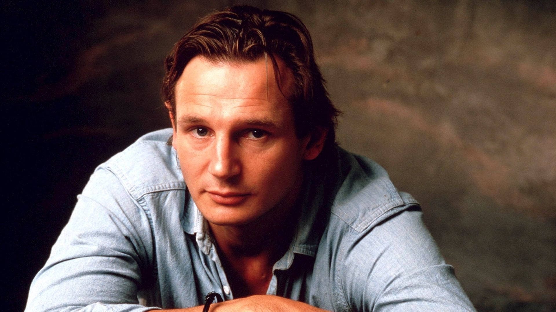 Liam Neeson, light blue denim shirt, muted textured background, Full HD Desktop Wallpaper