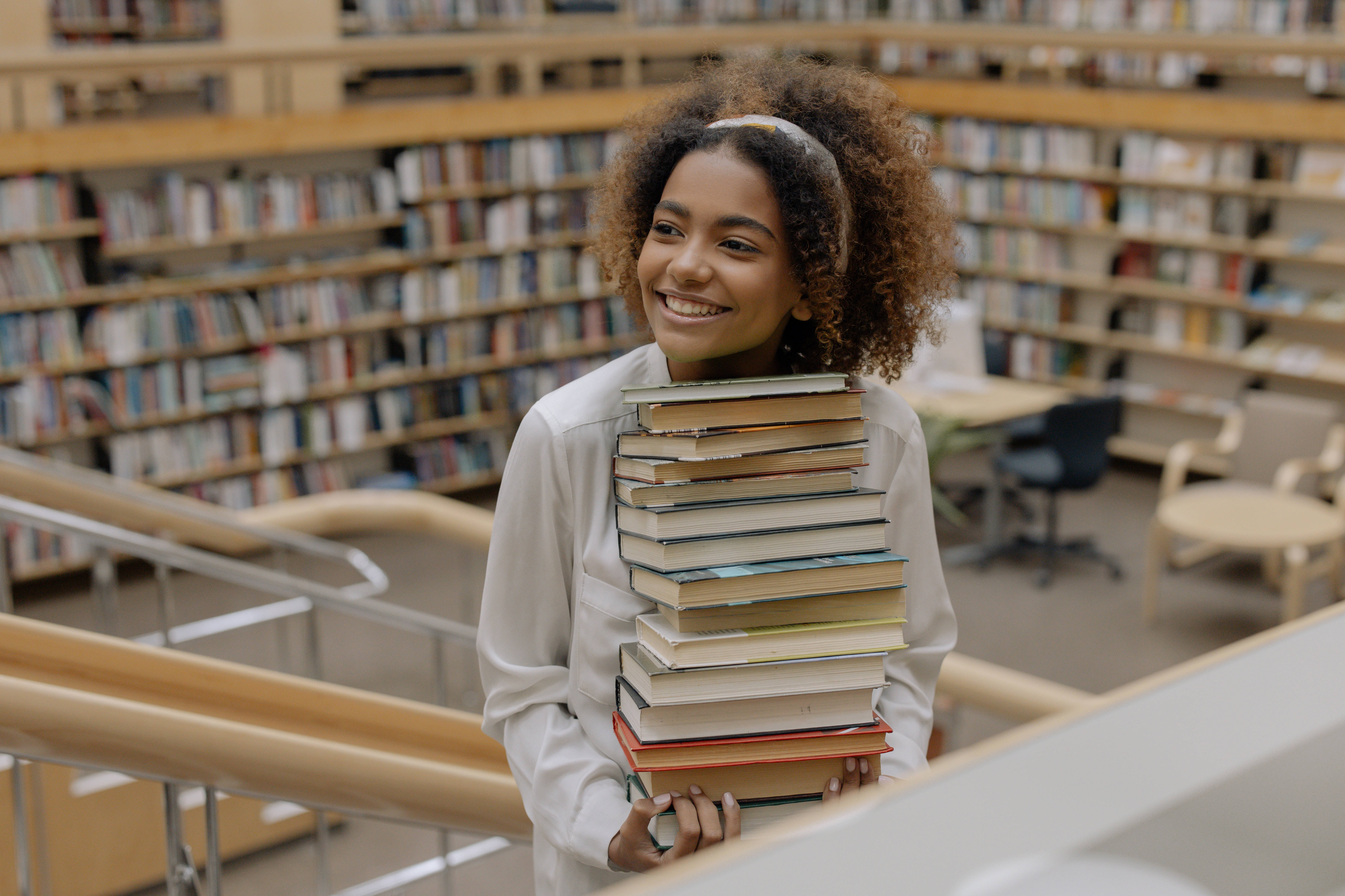 curly hair librarian, young woman, curly hair, 5K Desktop Wallpaper