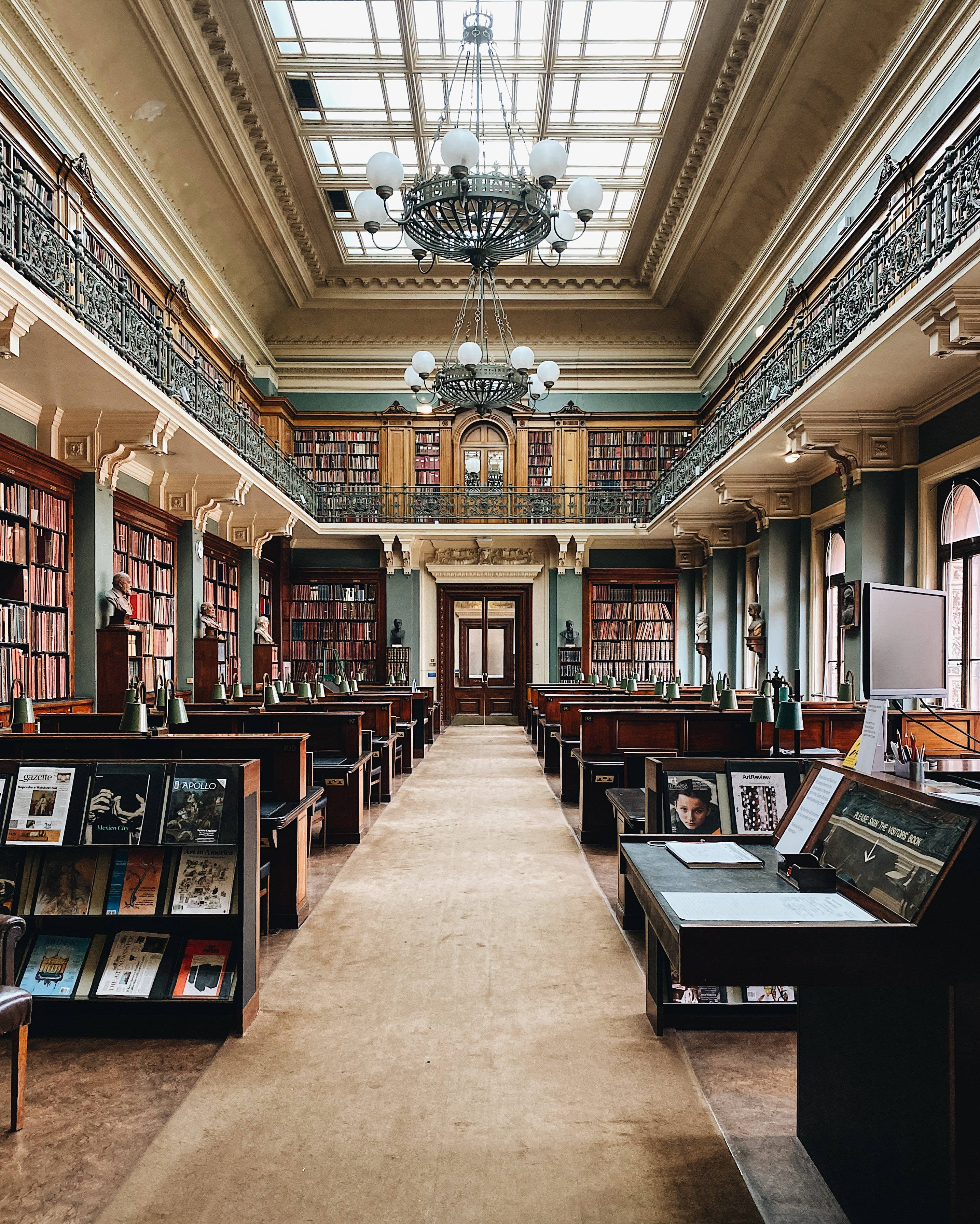 Grand historic library, towering bookshelves, ornate balconies, 2K Phone Wallpaper