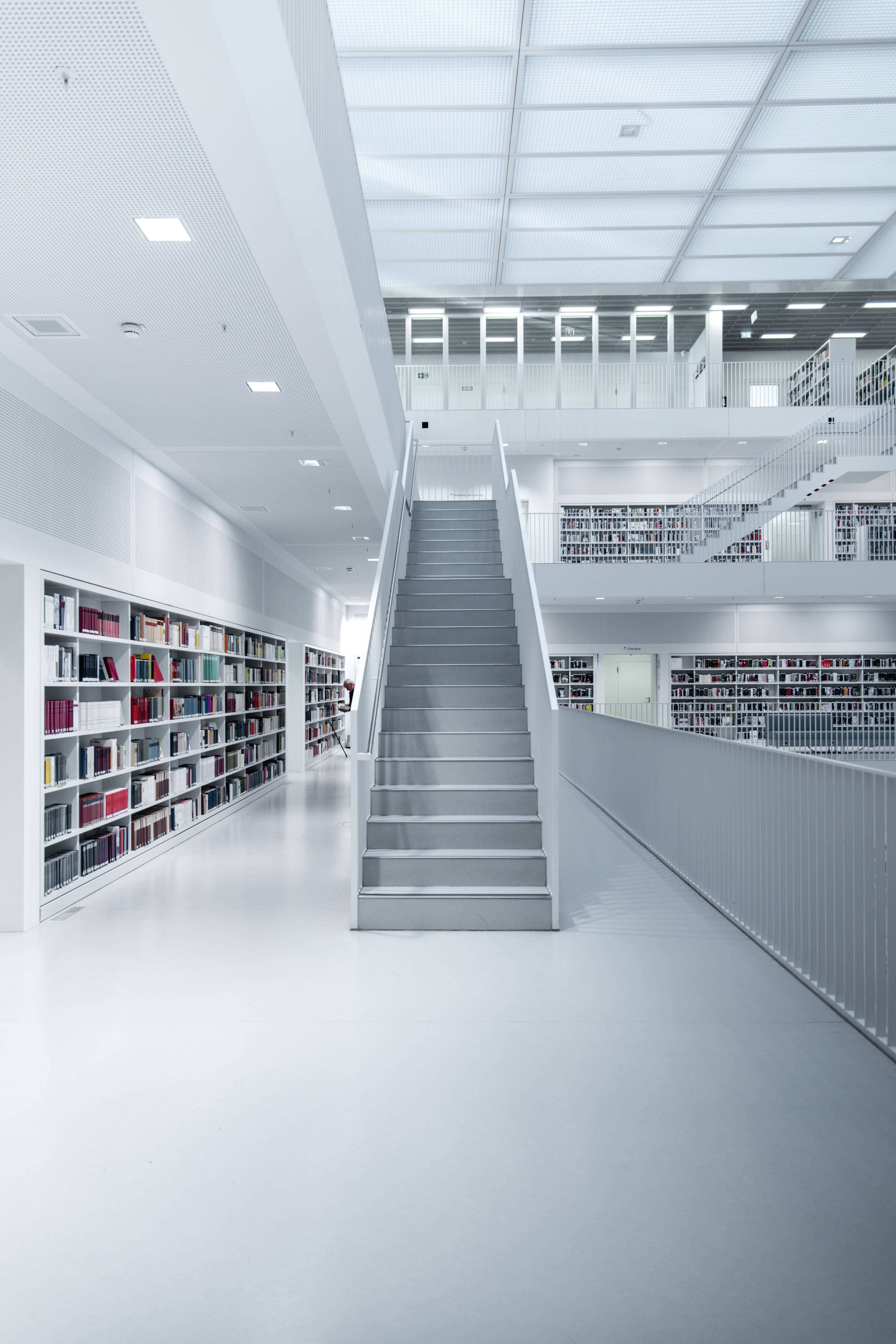 white aesthetic library, white walls, bookshelves, 5K Phone Wallpaper