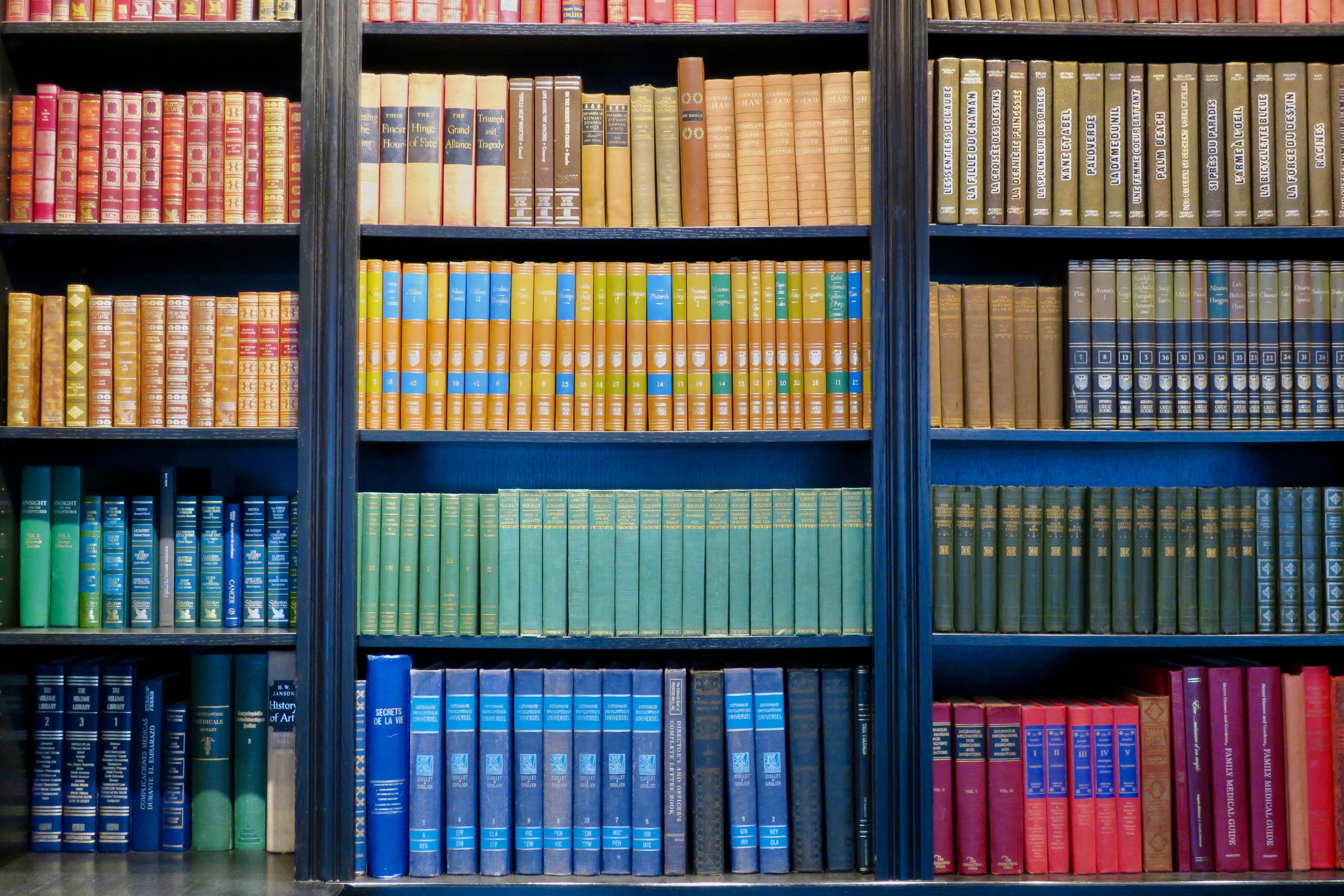 Rainbow Library Shelf, vintage books, dark wooden shelves, 4K Desktop Wallpaper