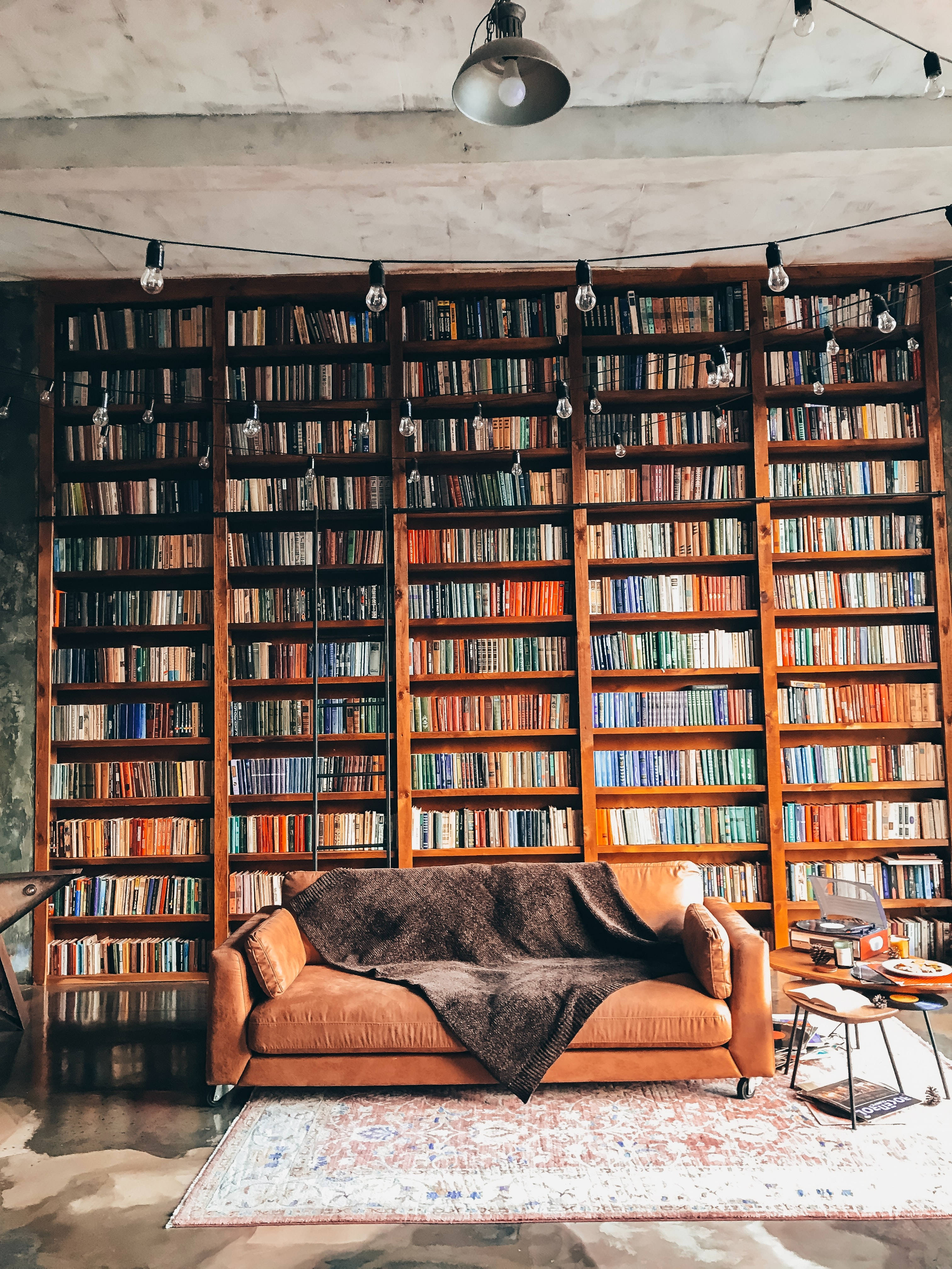 traditional library, cozy couch, brown leather sofa, 4K Phone Wallpaper