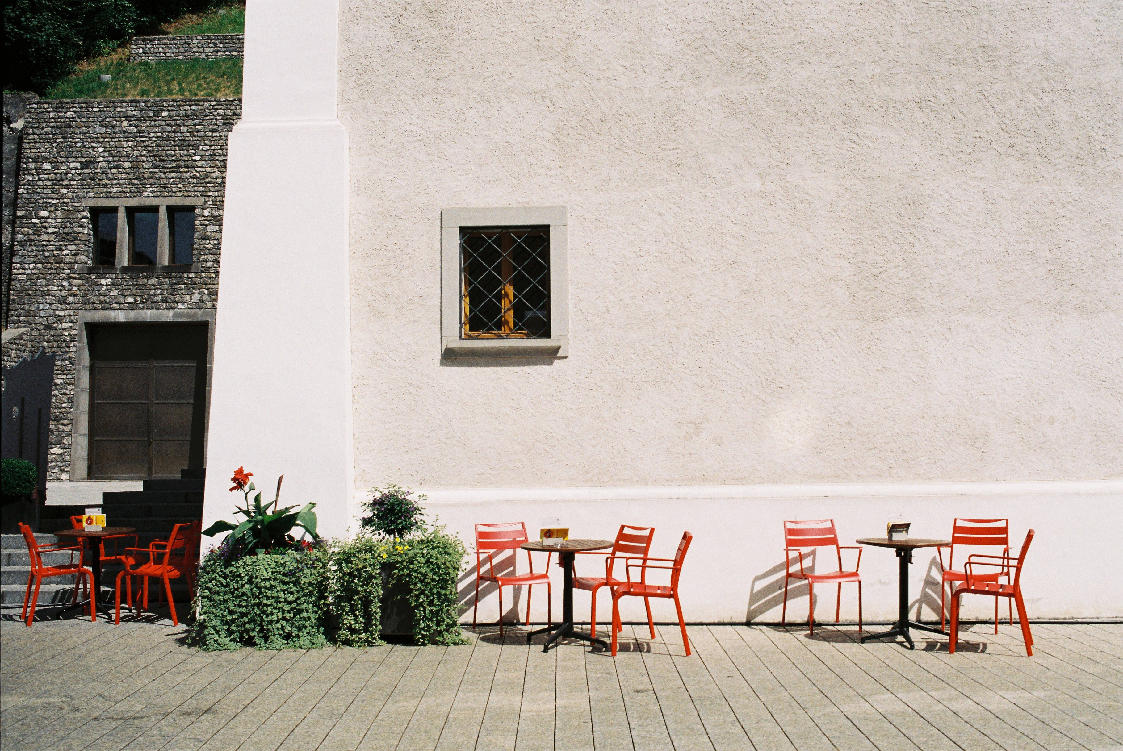 Liechtenstein, al fresco diner, vibrant orange chairs, 2K Desktop Wallpaper