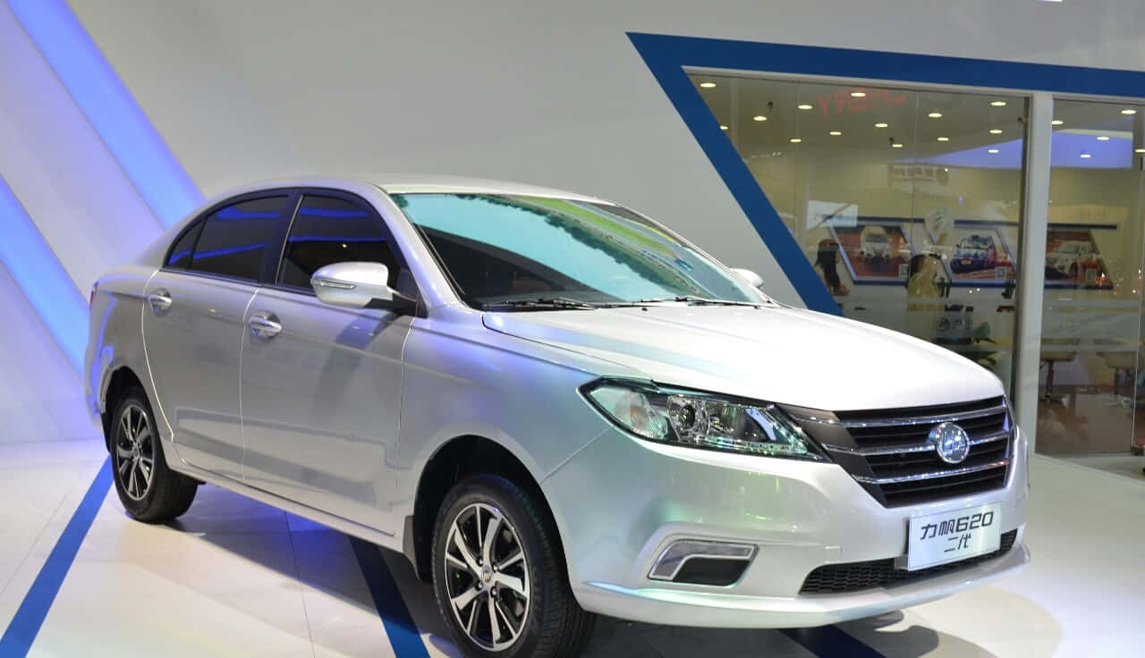 Lifan 620, sleek silver sedan, modern blue and white showroom floor, HD Desktop Wallpaper